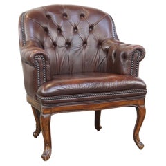 Classic, charming, properly finished cow leather English chesterfield armchair