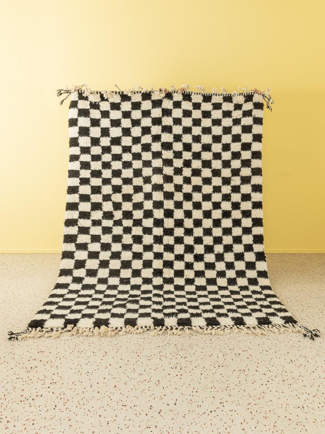 Classic Chess is a contemporary 100% wool rug – thick and soft, comfortable underfoot. Our Berber rugs are handwoven and handknotted by Amazigh women in the Atlas Mountains. These communities have been crafting rugs for thousands of years. One knot