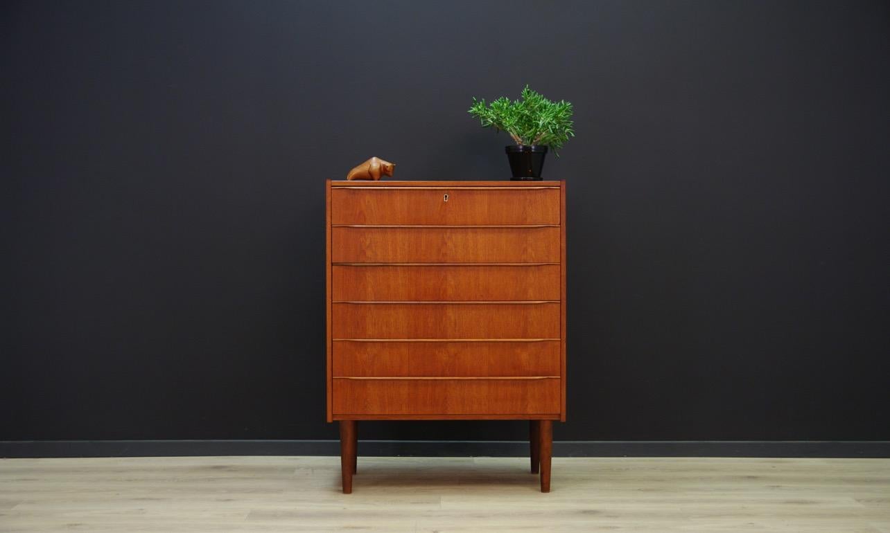 Chest of drawers from 1960s-1970s, Danish design, surface veneered with teak, has six capacious drawers. No key. Preserved in good condition (small bruises and scratches) - directly for use.

Dimensions: height 100.5 cm, width 76 cm, depth 42.5 cm.