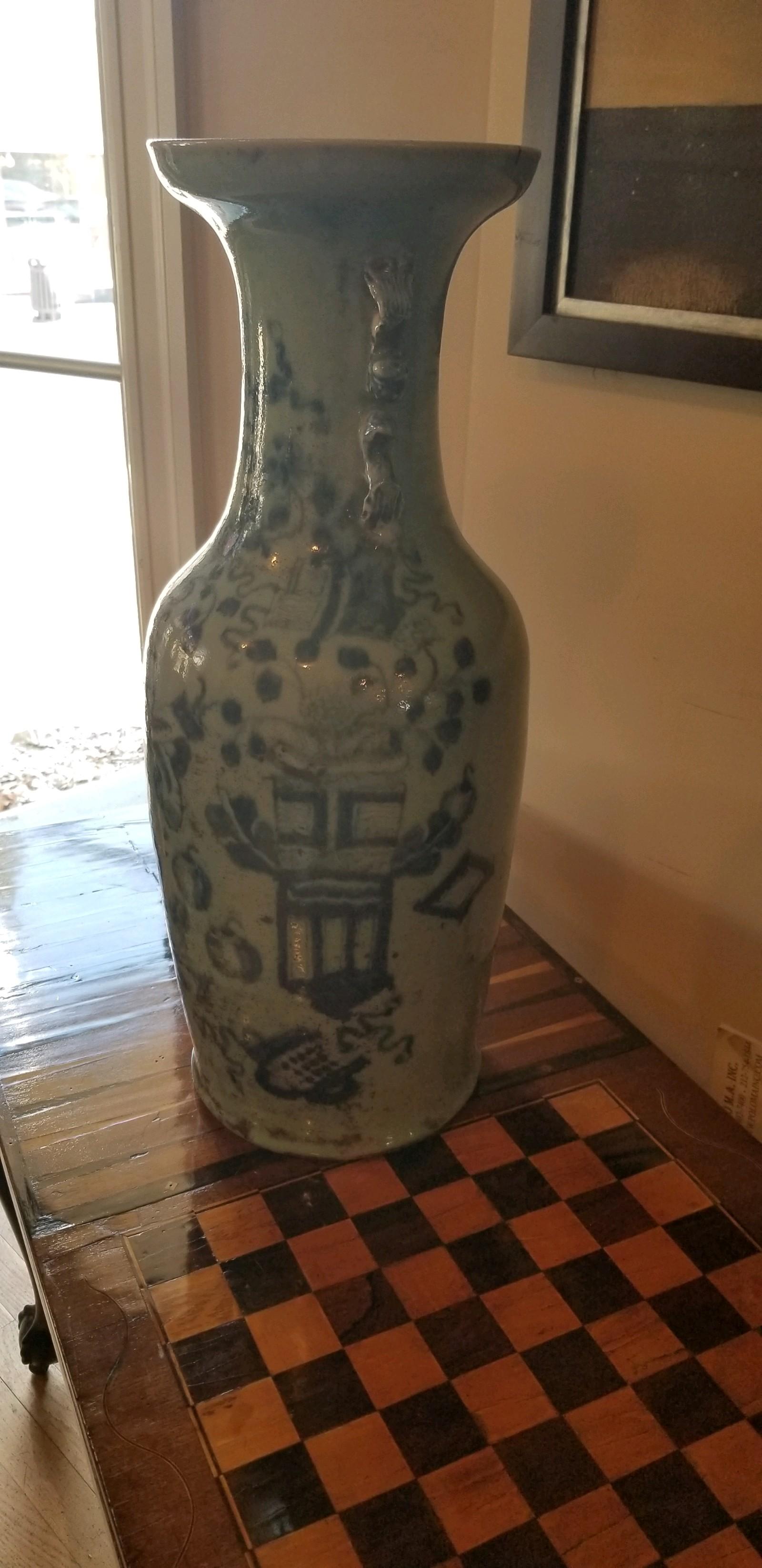 Classic Chinese celadon floor vase, 19th century is a wonderfully delicate celadon background with blue decoration. Part of your collection or a stand alone piece. See all photos for complete understanding of details. Good condition. Wear