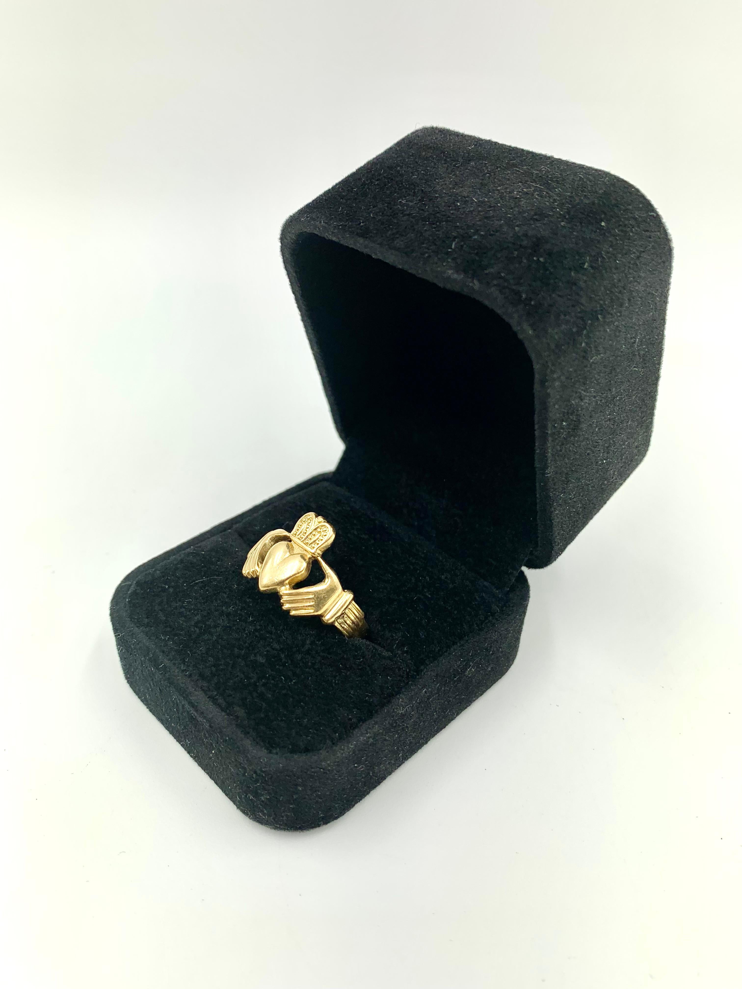 heart in hands ring