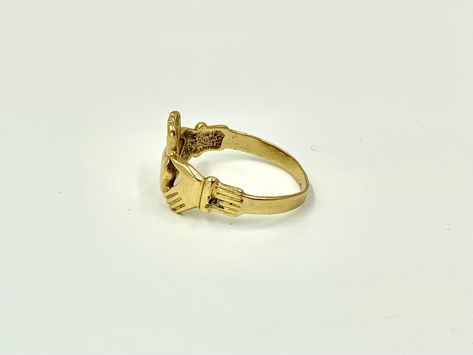 heart with hands ring