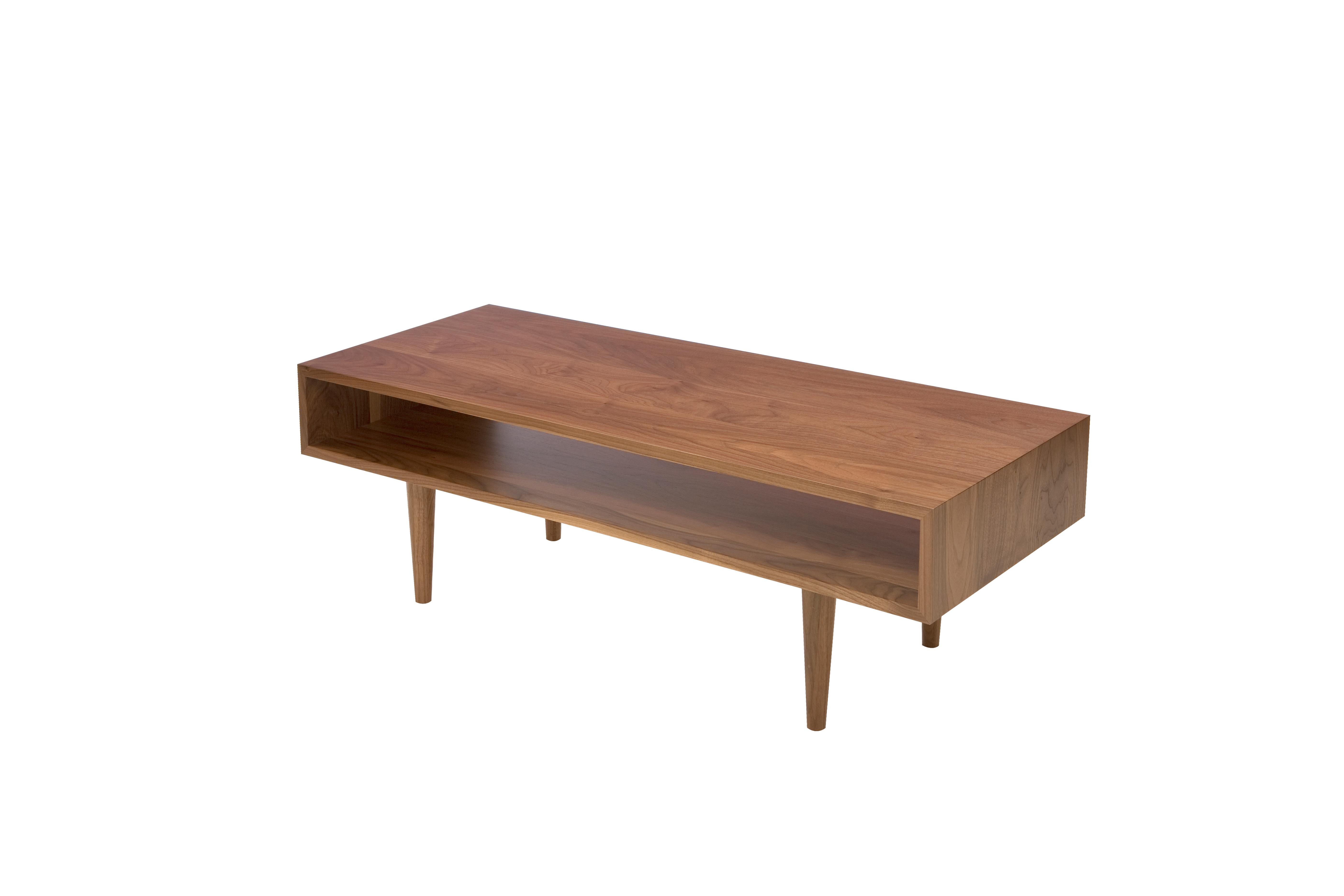 Sleek, modern and classic. A natural juxtaposition. Heavily influenced by mid-century design, this timeless piece complements both contemporary and more traditional interiors. Reinforced mitered joints allow the wood grain to wrap around the piece