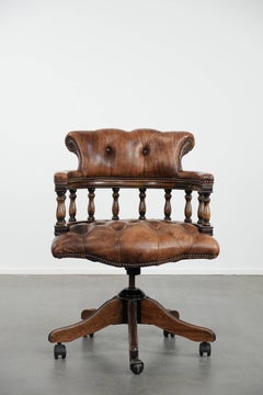 Classic cognac-coloured leather Chesterfield office chair in English style
