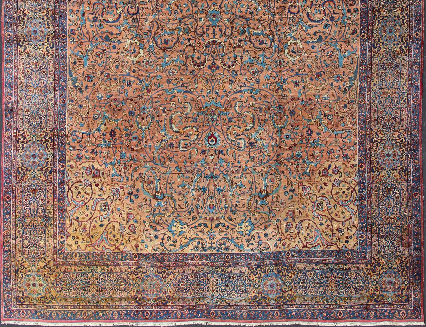 Classic Colorful Antique Large Lavar Kerman Persian Rug in Salmon Background  

Antique Lavar Kerman Rug. Keivan Woven Arts / rug S12-0903, country of origin / type: Persian / Lavar, circa Early-20th Century.

Measures 11'11 x 18'8.

This