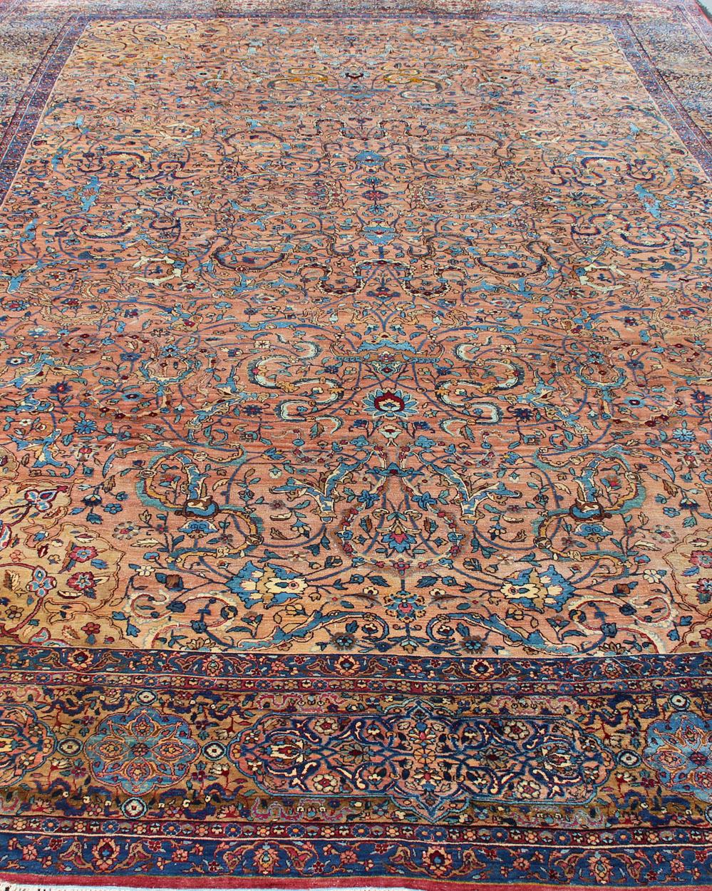 Classic Colorful Antique Large Lavar Kerman Persian Rug in Salmon Background In Good Condition For Sale In Atlanta, GA