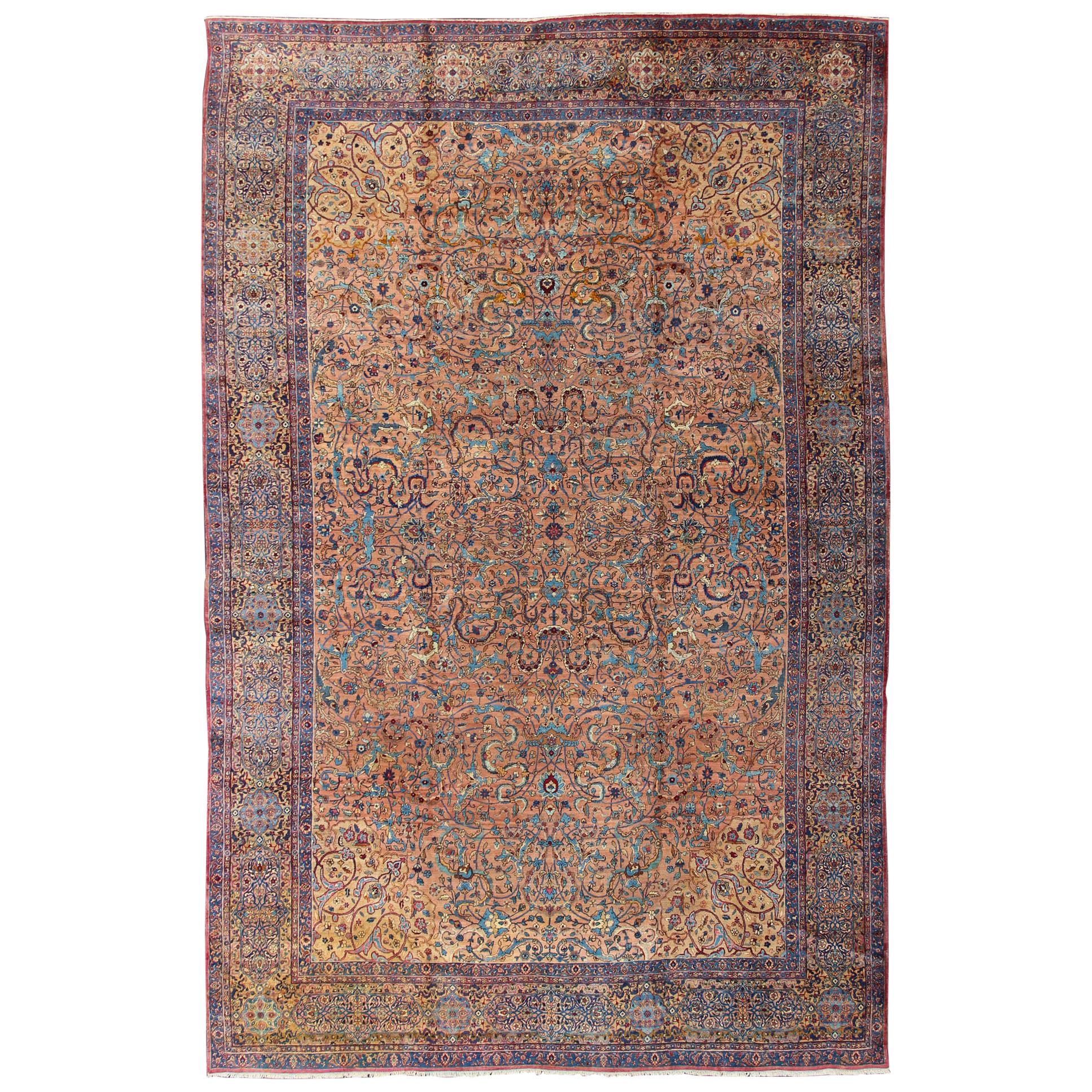 Classic Colorful Antique Large Lavar Kerman Persian Rug in Salmon Background For Sale