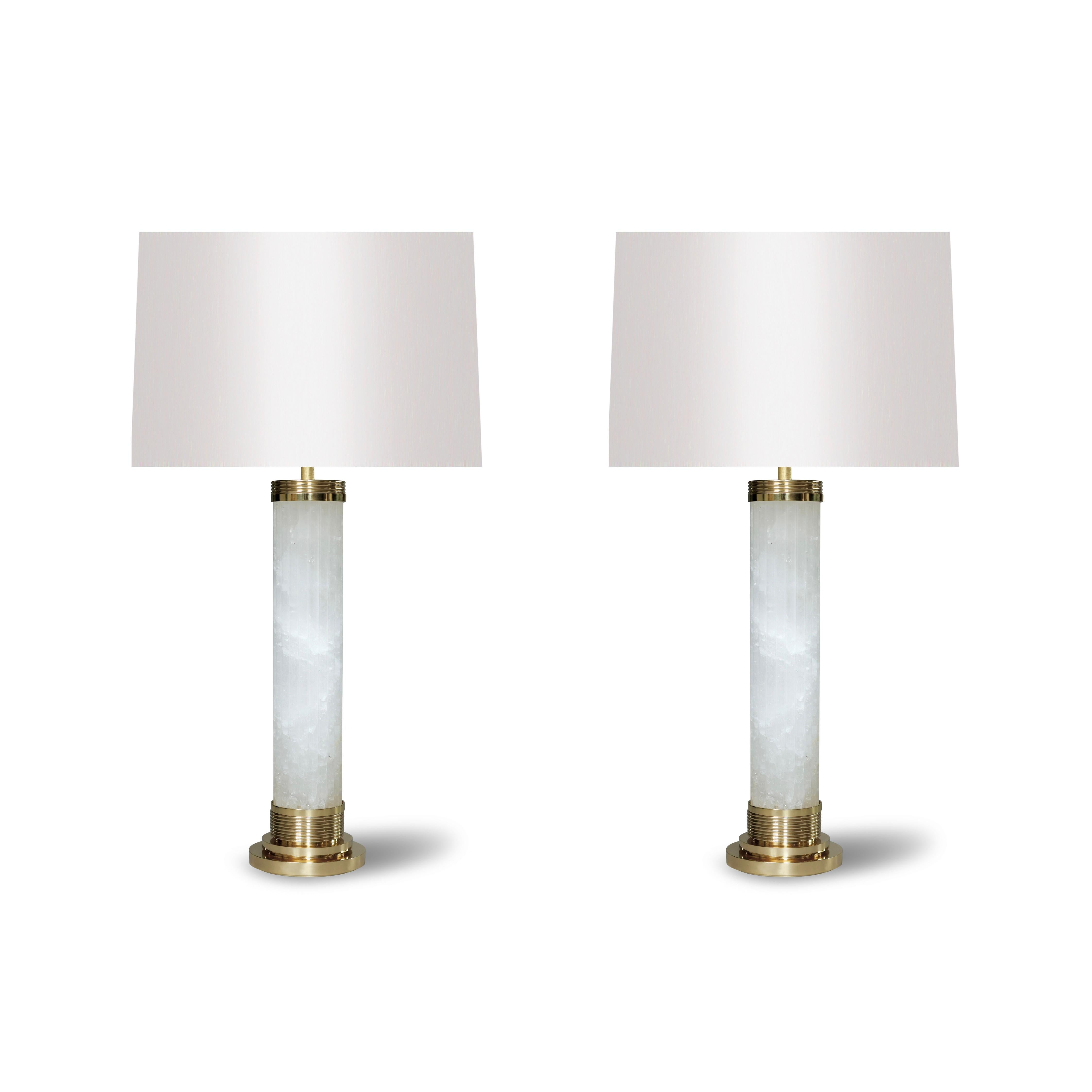 Pair of Finely carved  rock crystal ridged columns lamps,polished brass finish.
To the top of the rock crystal 17 inch 
Lampshades are not included 