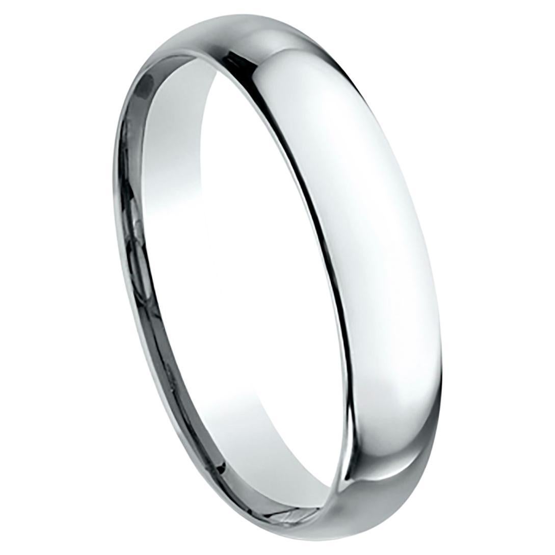 Benchmark wedding band in 14K white gold polished finish. Width 4mm, high dome comfort fit. Custom engraving and finishing available. Size 10 US and resizable upon request. Available in 1/4, 1/2, and 3/4 sizes, for more information please message us