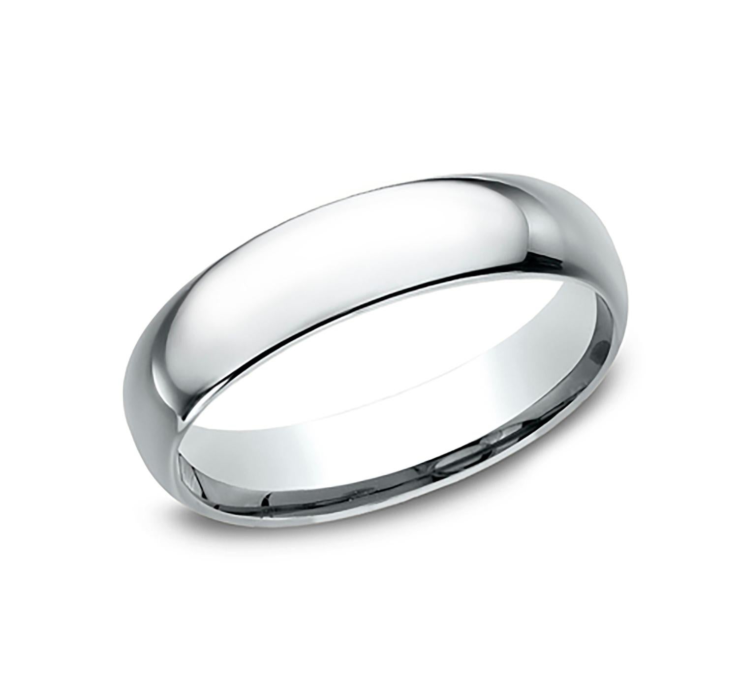 Benchmark wedding band in 14K white gold polished finish. Width 5mm, high dome comfort fit. Custom engraving and finishing available. Size 11 US and resizable upon request. Available in 1/4, 1/2, and 3/4 sizes, for more information please message us
