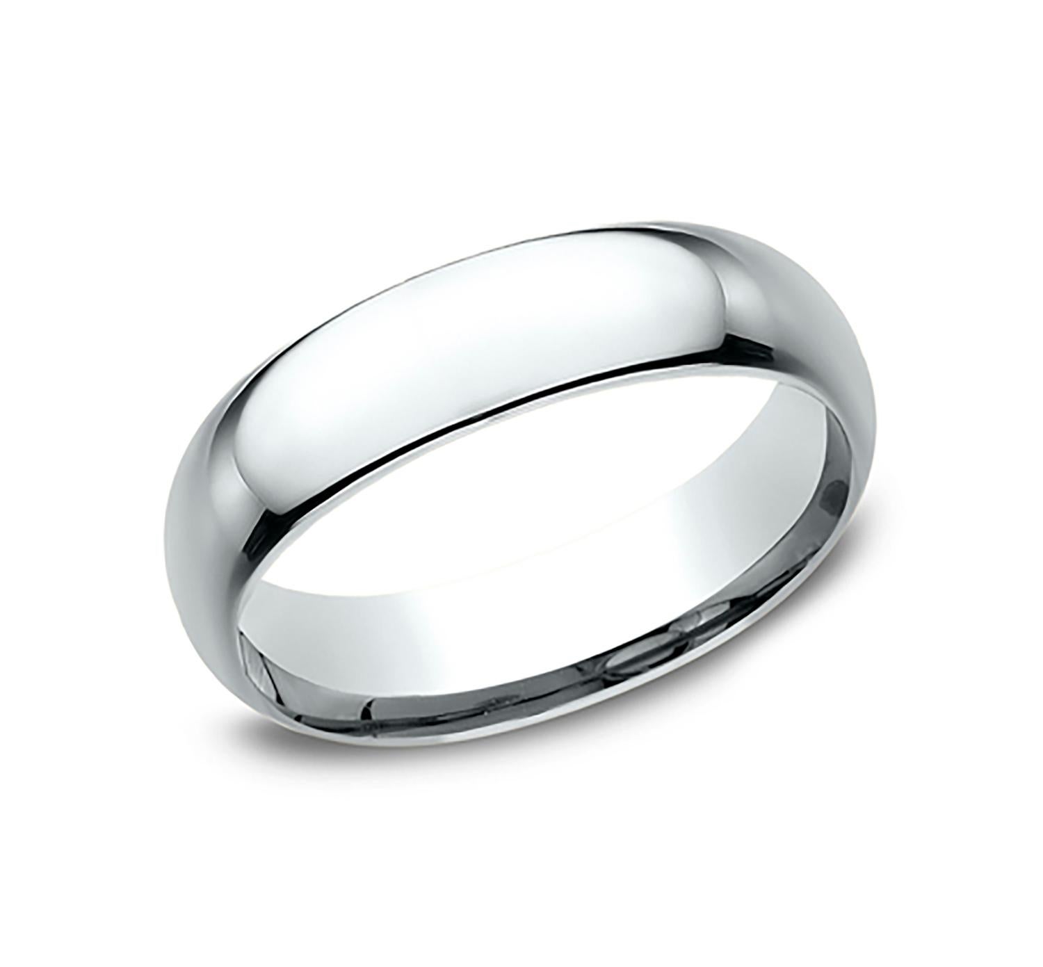 Benchmark wedding band in polished platinum finish. Width 6mm, high dome comfort fit. Custom engraving and finishing available. Size 9 US and resizable upon request. Available in 1/4, 1/2, and 3/4 sizes, for more information please message us on