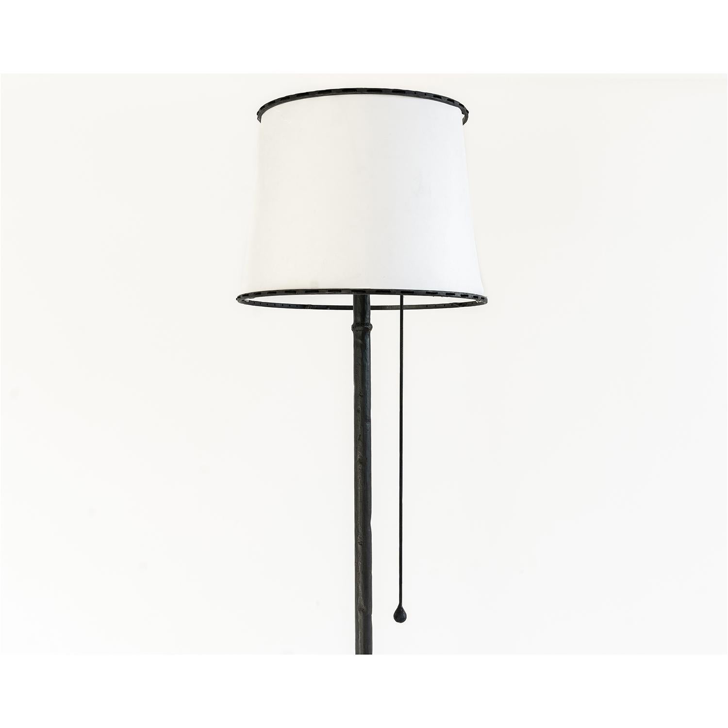 LAMP NO. 1 
J.M. Szymanski
d. 2020

This special floor lamp features a linen shade and a carved steel base. A single tear drop pull is used to operate the lamp. 

Custom sizes available. Made in the Bronx, New York, USA.

Our products are fabricated