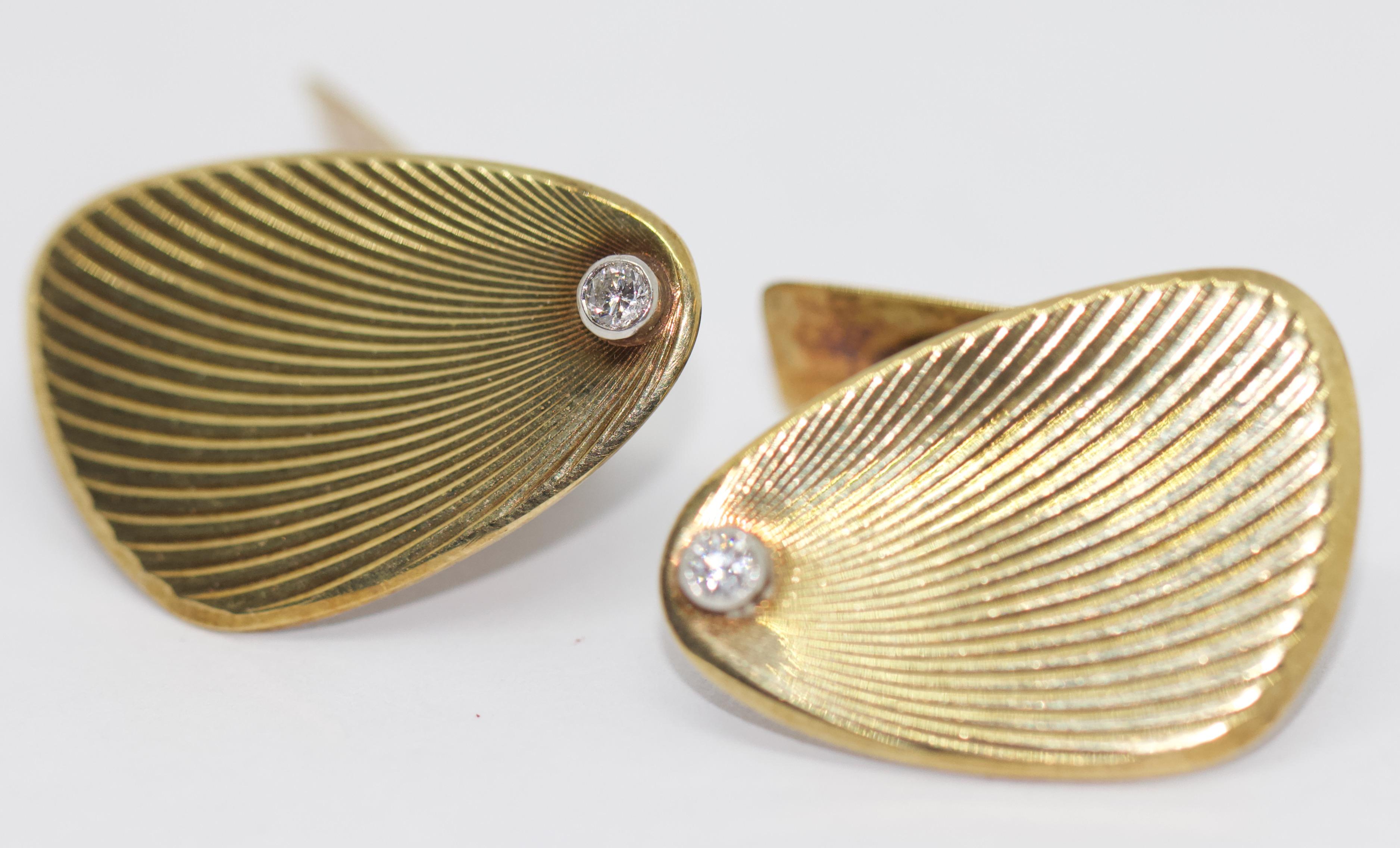 Classic Cufflinks, 14K Yellow Gold with Diamonds.

Cufflinks are hallmarked.


Including certificate of authenticity.