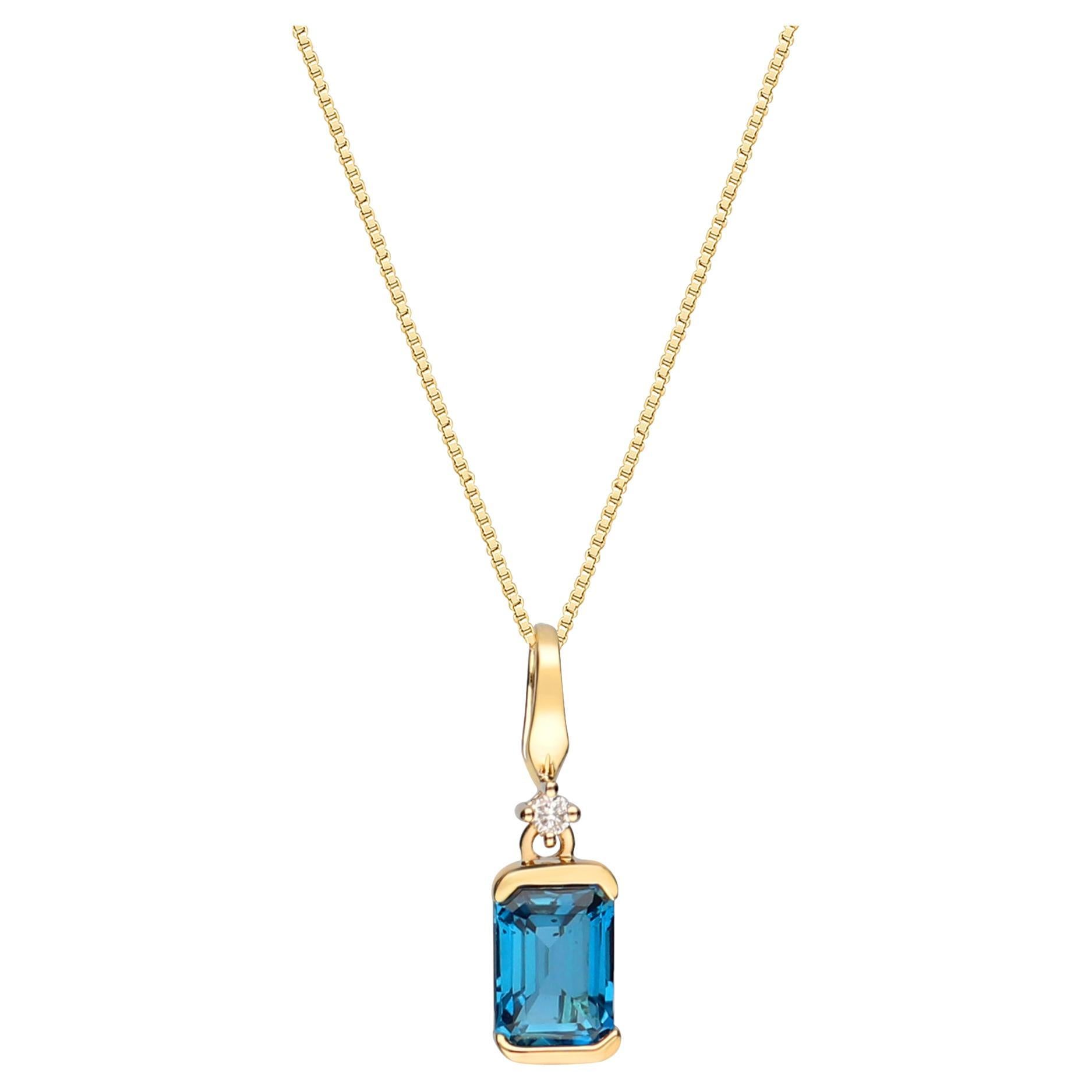 Classic Cushion-Cut London Blue Topaz 14k Yellow Gold White Diamond Pendant For Sale