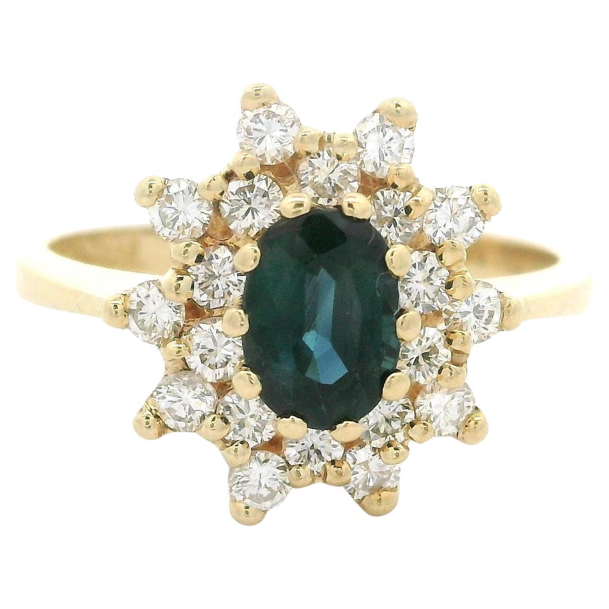 Anillo pequeño de oro amarillo de 14k con zafiro de 1,25 quilates y halo de diamantes