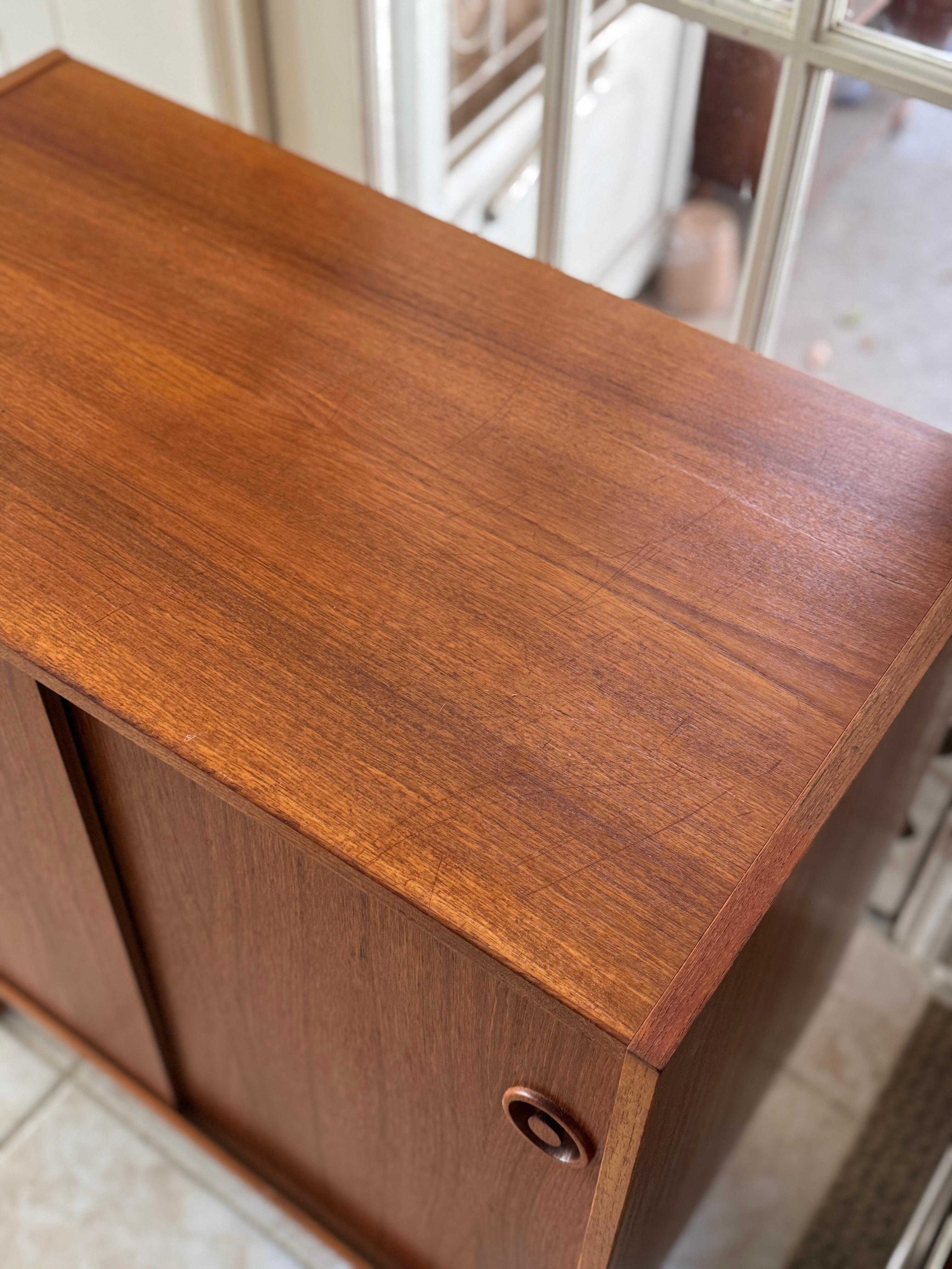 Mid-Century Modern Classic Danish mid century modern teak record cabinet with sliding doors For Sale