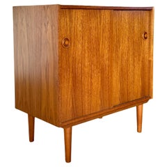 Classic Danish mid century modern teak record cabinet with sliding doors