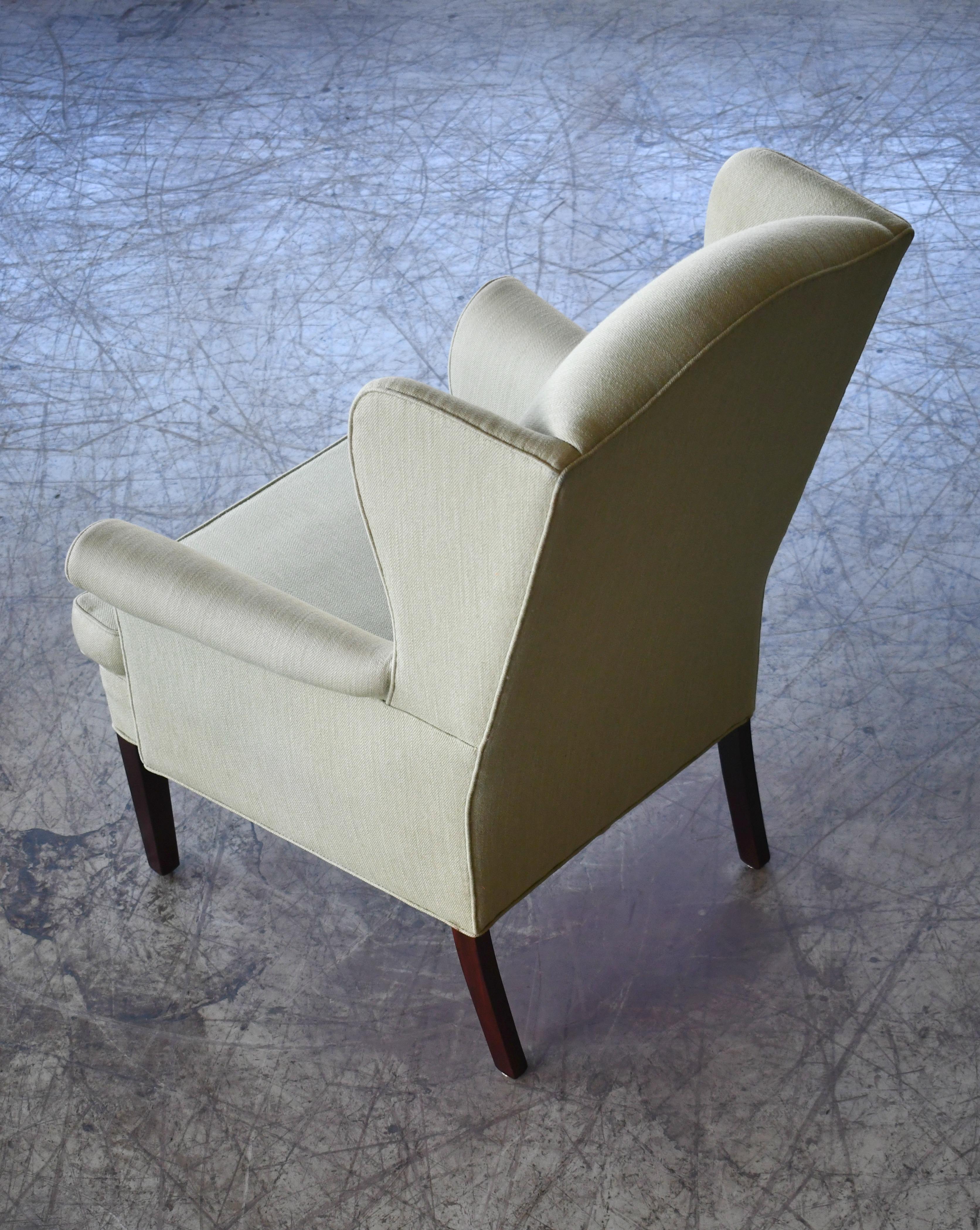 Mid-20th Century Classic Danish Midcentury Wingback Chair in Light Green Wool