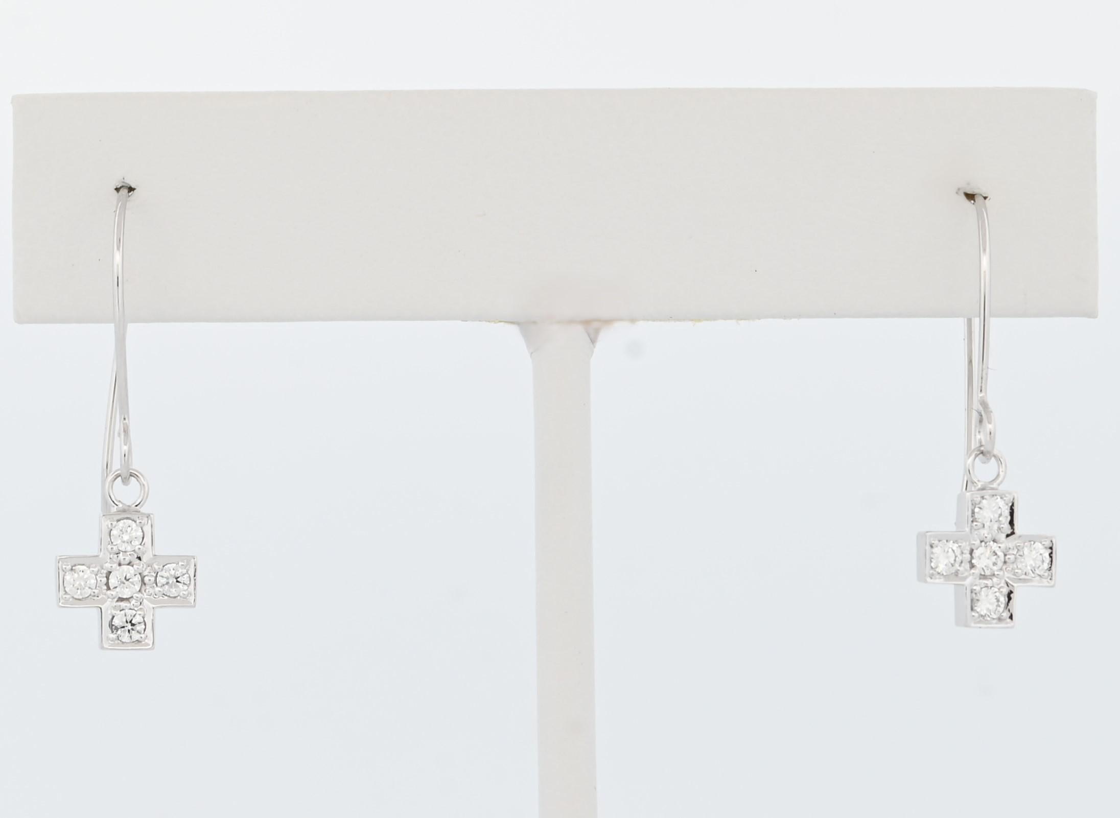 Designed to be both classic and contemporary, these petite cross earrings offer a meaningful and stylish accessory that complements any outfit. Elevate your look with the perfect balance of grace and glamour.

18K White Gold
Ct wt. - .30
White