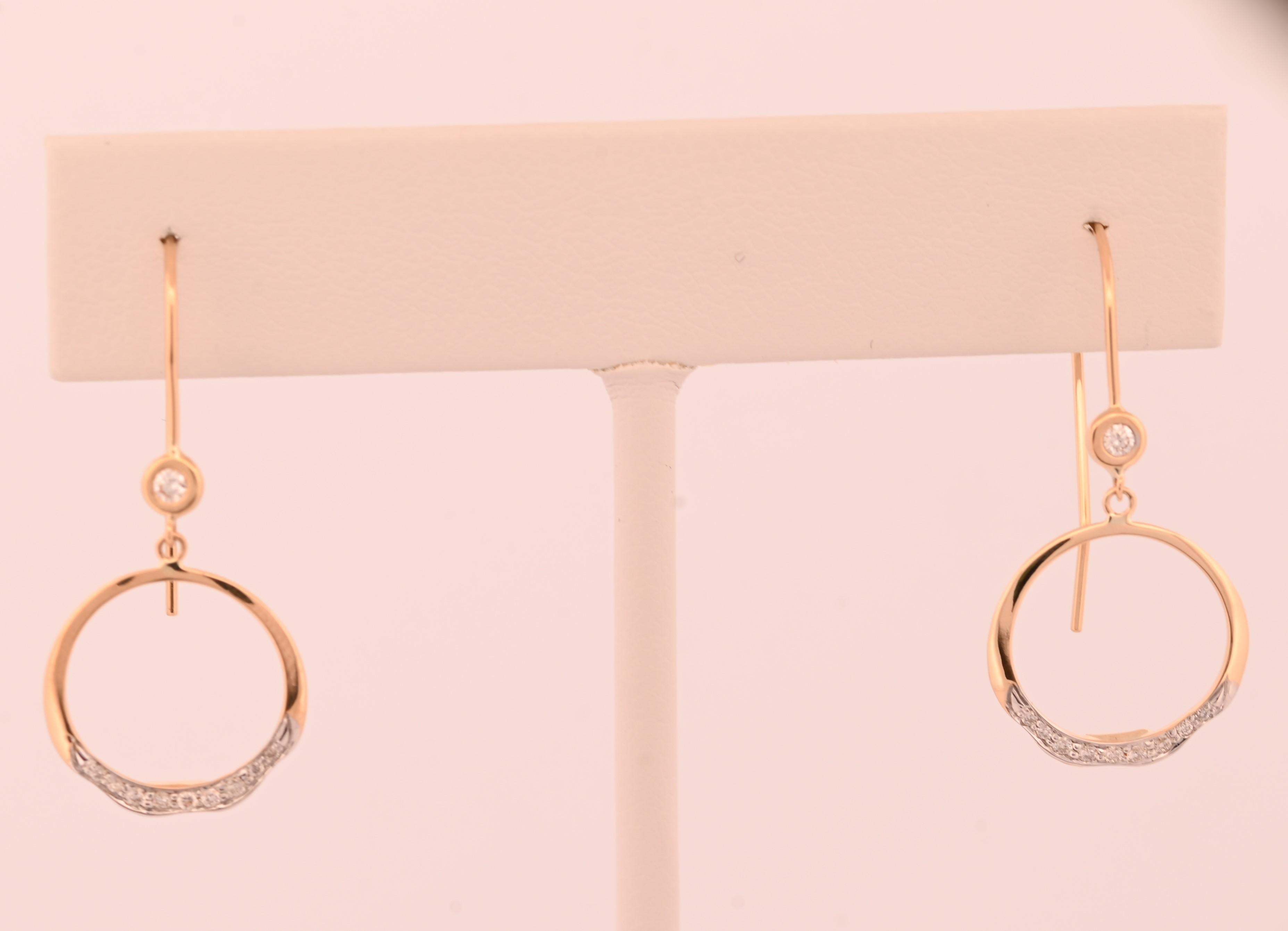 With their refined design and radiant sparkle, the Soleil earrings are a beautiful addition to any jewelry collection, embodying both classic charm and contemporary flair.

18K Yellow Gold 
Ct wt. - .16
White diamonds
D VSII

Made in the USA. 