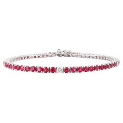 Bracciale tennis di fidanzamento con rubini e diamanti dal design classico in oro bianco 14k