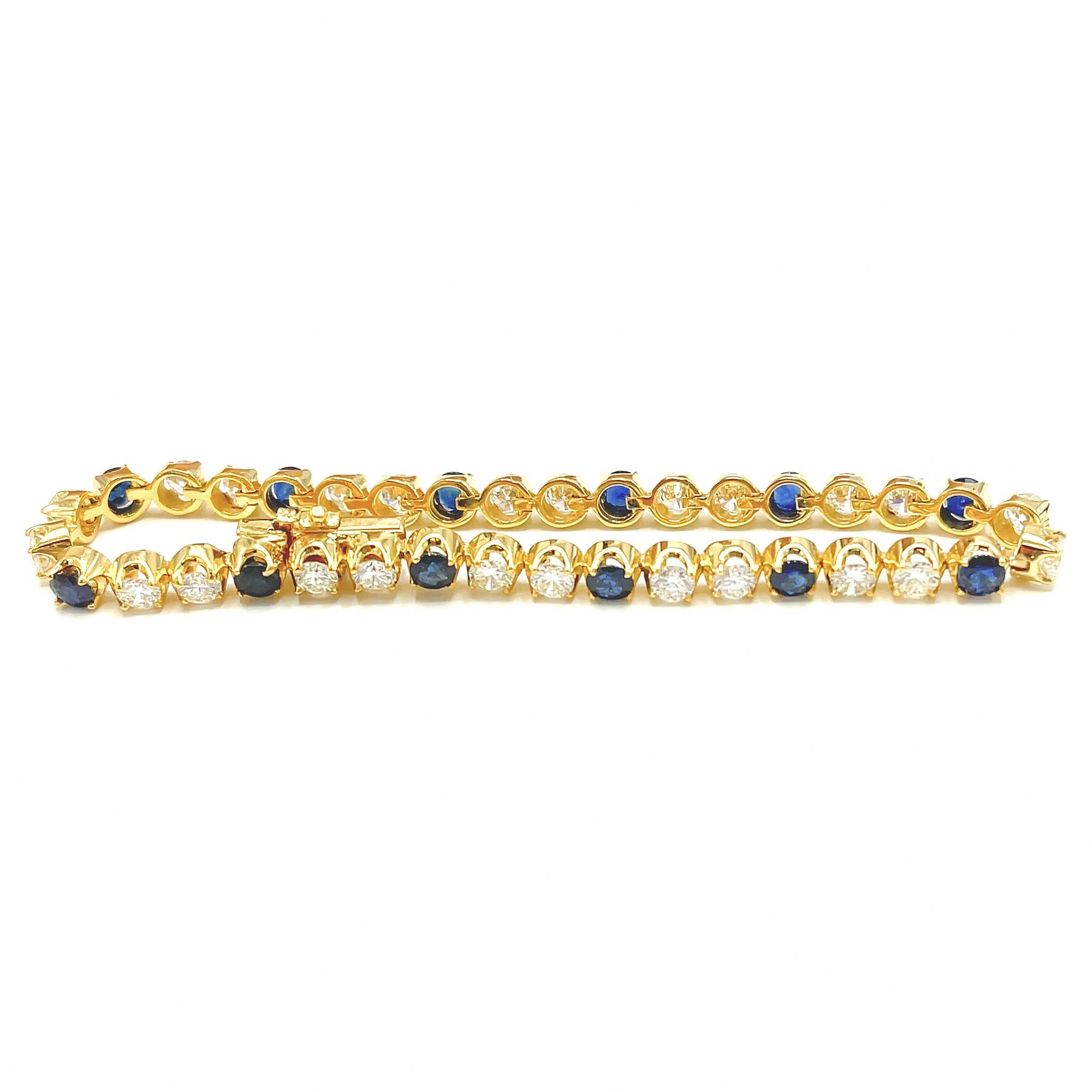 This diamond bracelet lends instant elegance to your wrist. Worn alone it's a luxurious evening classic, layered with a watch it adds effortless style to your daytime look.

18k Yellow Gold
Diamond: 4.30 ct twd
Sapphire: 3 tcw
Length: 7 inches
Total