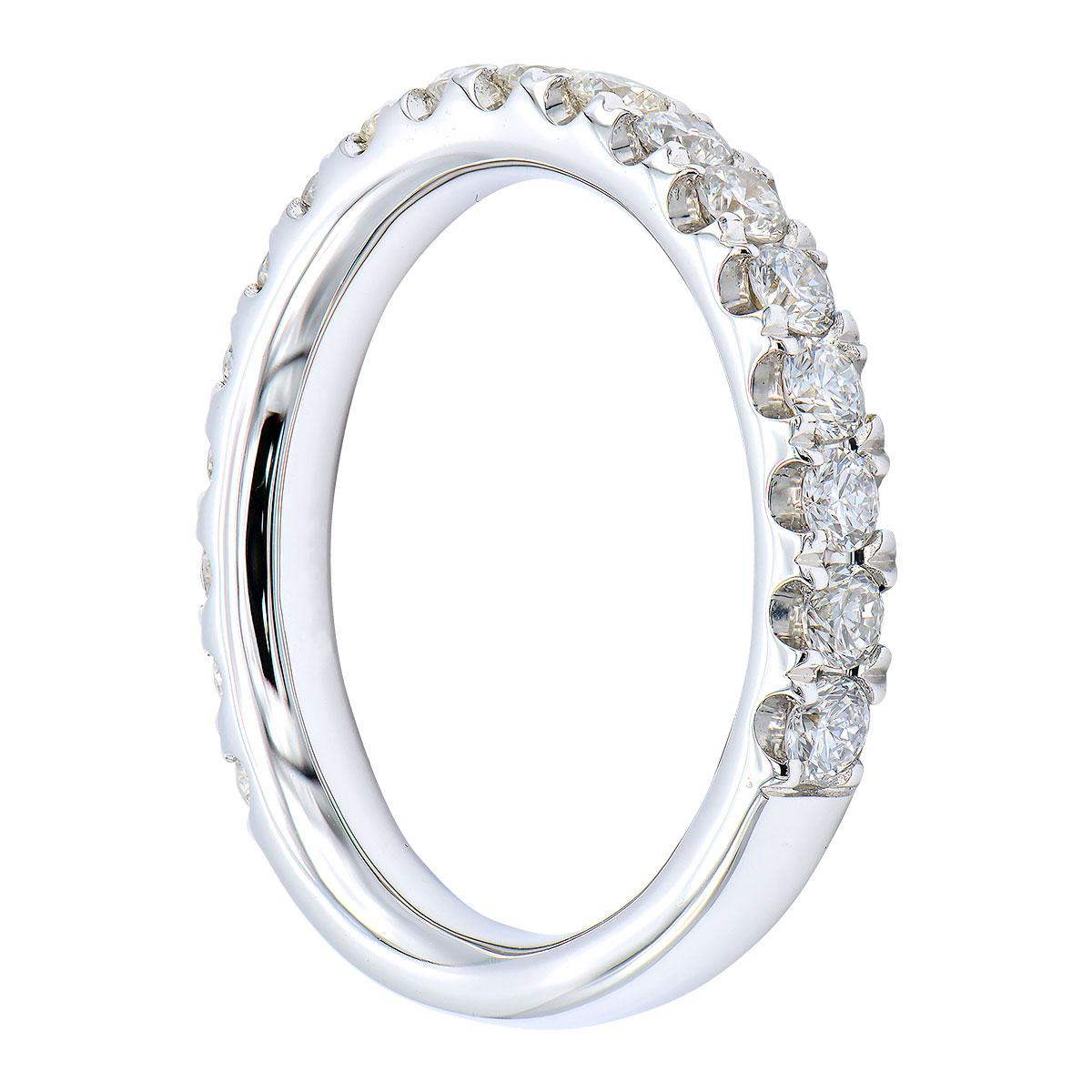 Classic, Timeless and Simple. Always in style and can be worn all the time. This makes up the perfect diamond band. This band is made from 15 round VS2, G color diamonds which are set in a row halfway around the band in 4.5 grams of 18 karat white