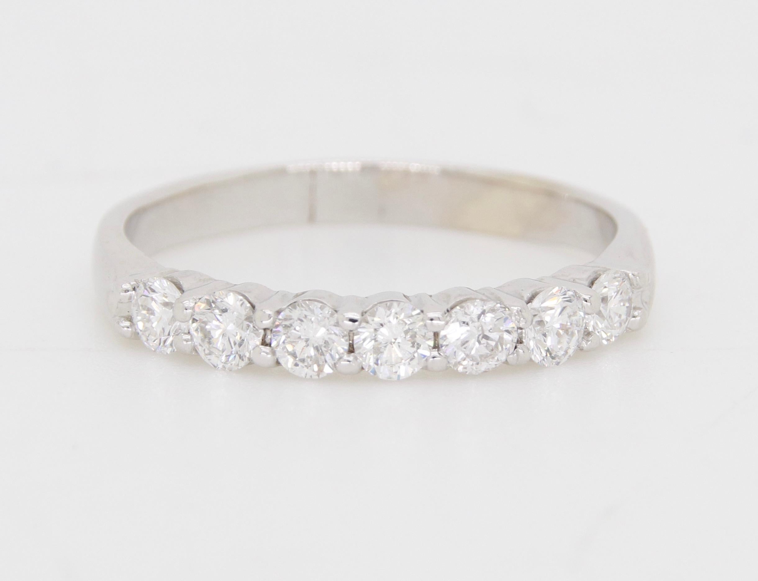 Classic diamond band made with .70ctw of Round Brilliant cut diamonds in 18k White Gold. 

Diamond Cut: Round Brilliant 
Total Diamond Carat Weight: .70CTW
Average Diamond Color: G-I
Average Diamond Clarity: SI2-I1
Metal: 18k White Gold
Ring Size: