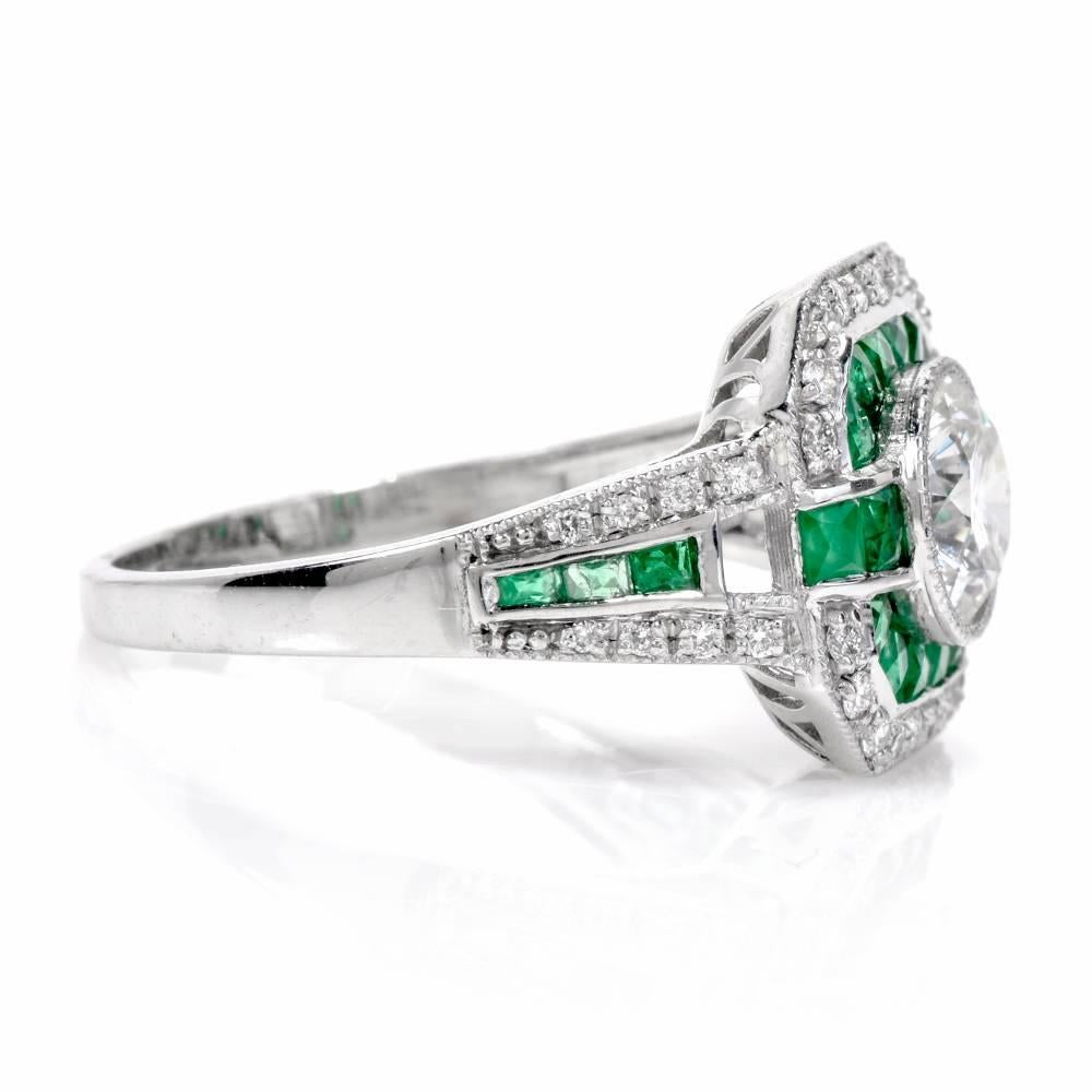 This beautiful antique style Diamond & Emerald ring handcrafted in solid Platinum. Centered with 1 genuine round cut Diamond approx: 0.95 carats, G-H color,VS1 clarity, bezel set, it is adorned with 22 genuine French cut Emeralds  approx: 0.75cttw,