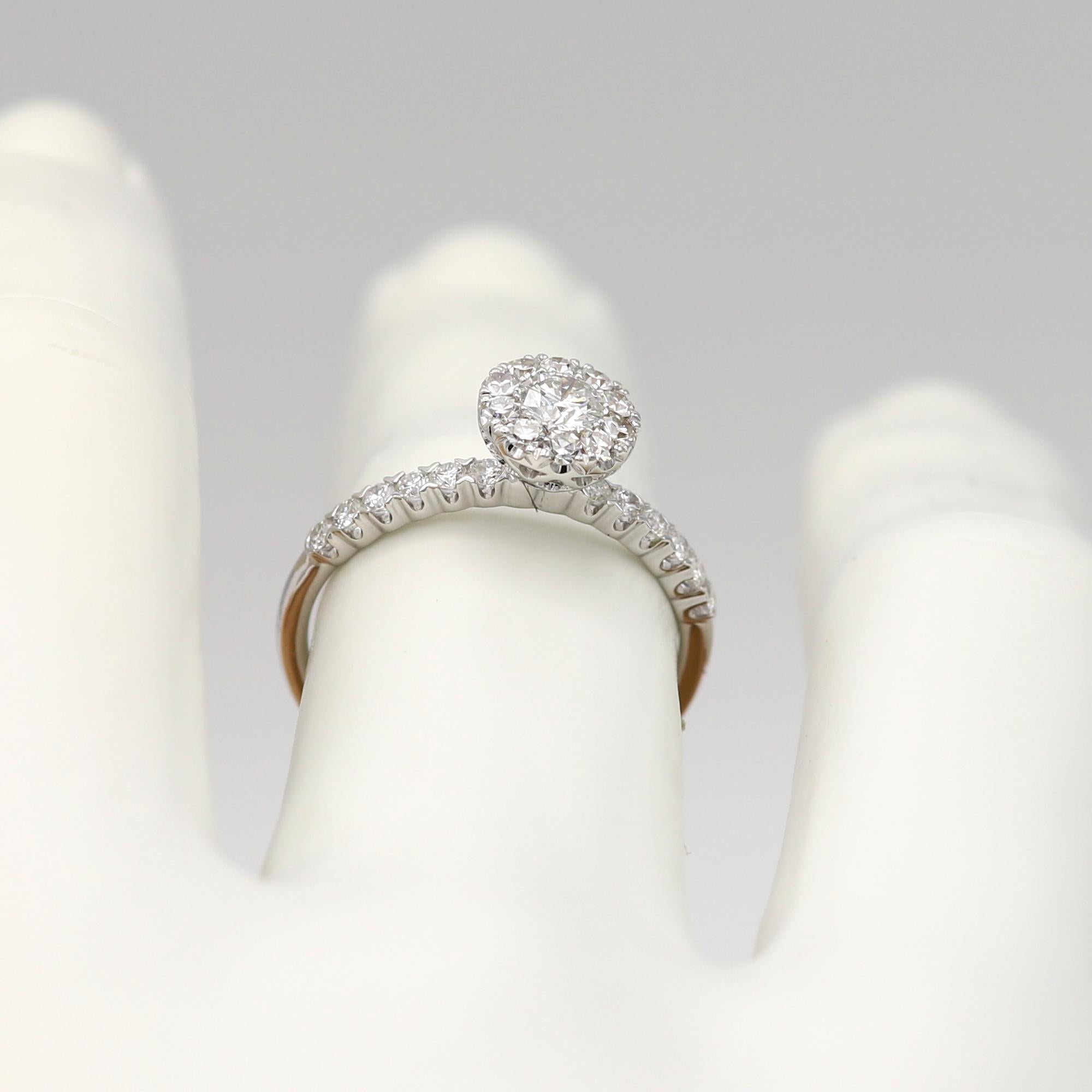 High Quality Diamond Ring - Super Cluster setting.
to the eye as a small distance the top area looks like one large Diamonds becuase of the pricision of the setting and the fine workmanship plus the sparkling white diamonds - all combine produced a