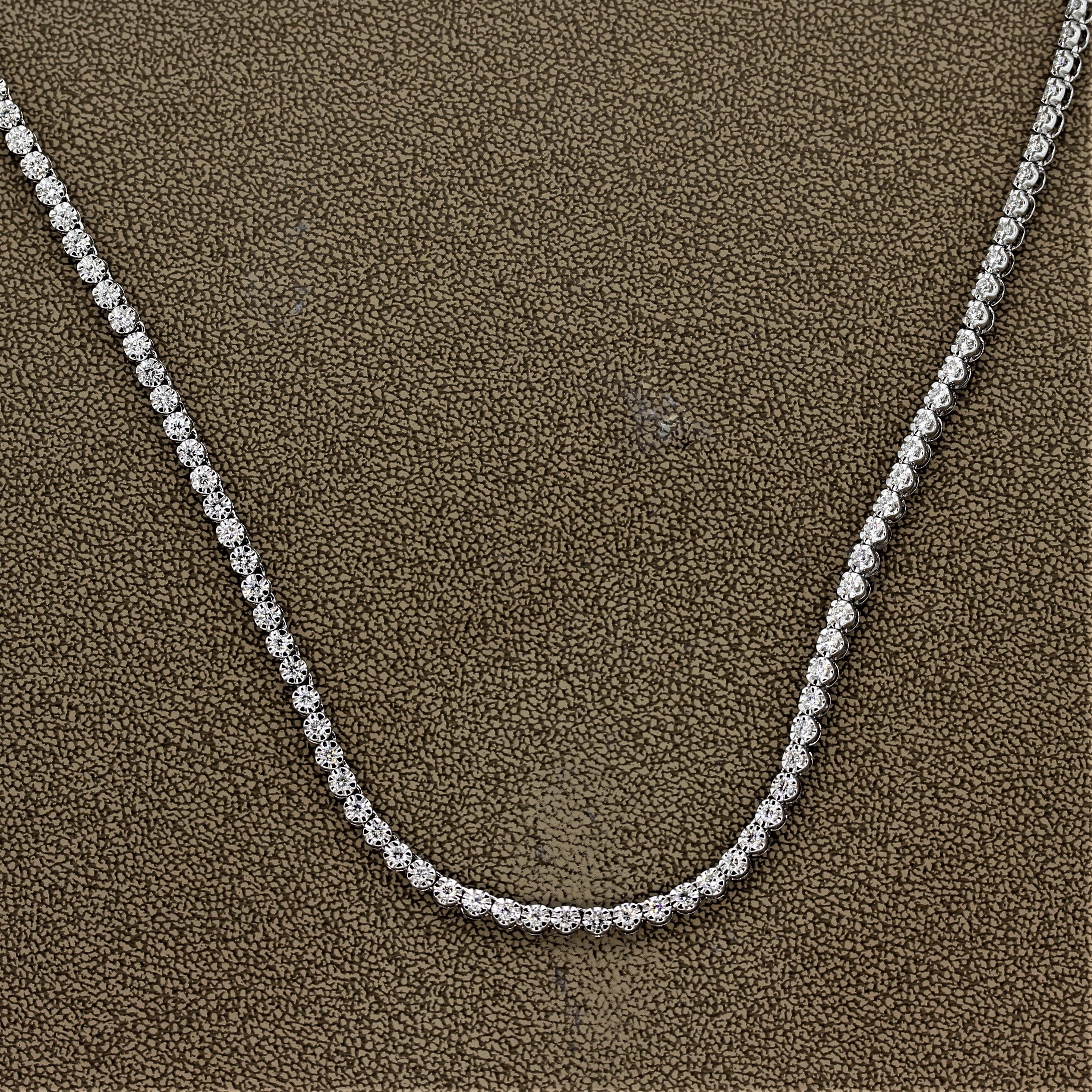 A simple yet timeless tennis necklace featuring 7.63 carats of round brilliant cut diamonds. Made in 14k white gold with a safety clasp ensuring a secure closure.

Length: 24 inches