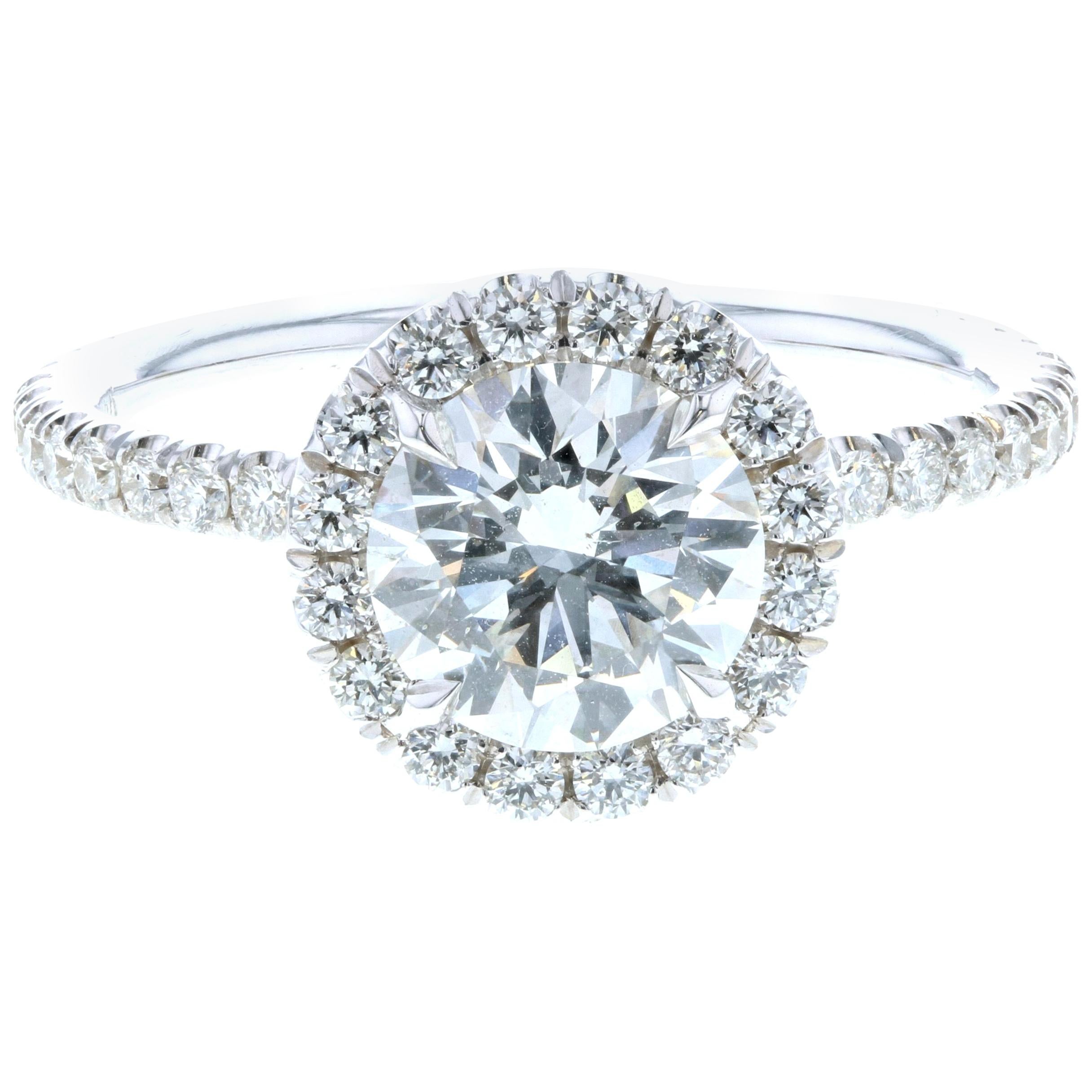 Classic Diamond Halo Engagement Ring with Diamonds on the Legs For Sale
