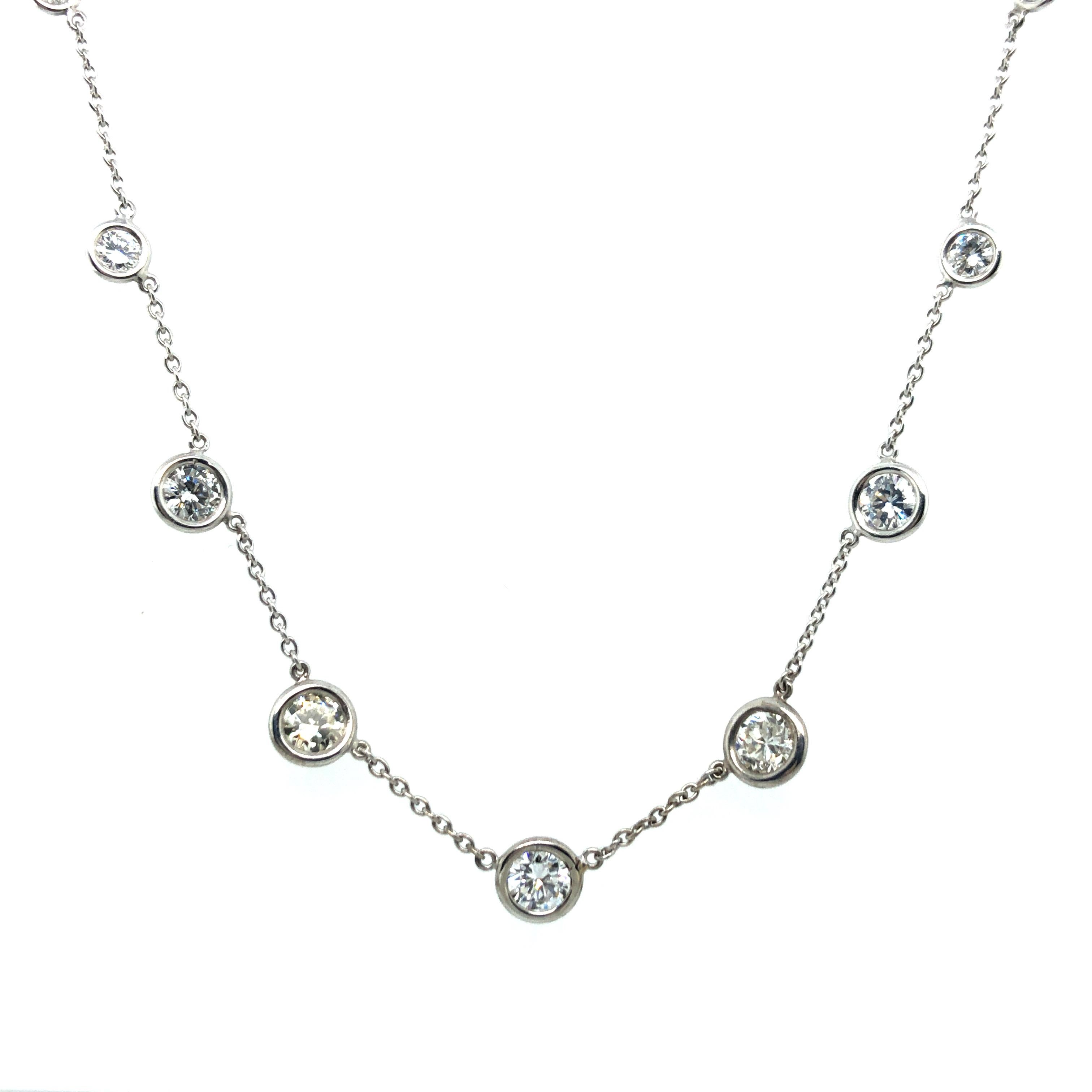 Delicate diamond necklace crafted in white gold 18 karat. Fine anchor chain interrupted by 9 brilliant-cut diamonds totalling 2.75 ct of G/8H/I colour and vs clarity. The bezel set diamonds range from 0.10 ct to 0.48 ct in individual weights. Chain