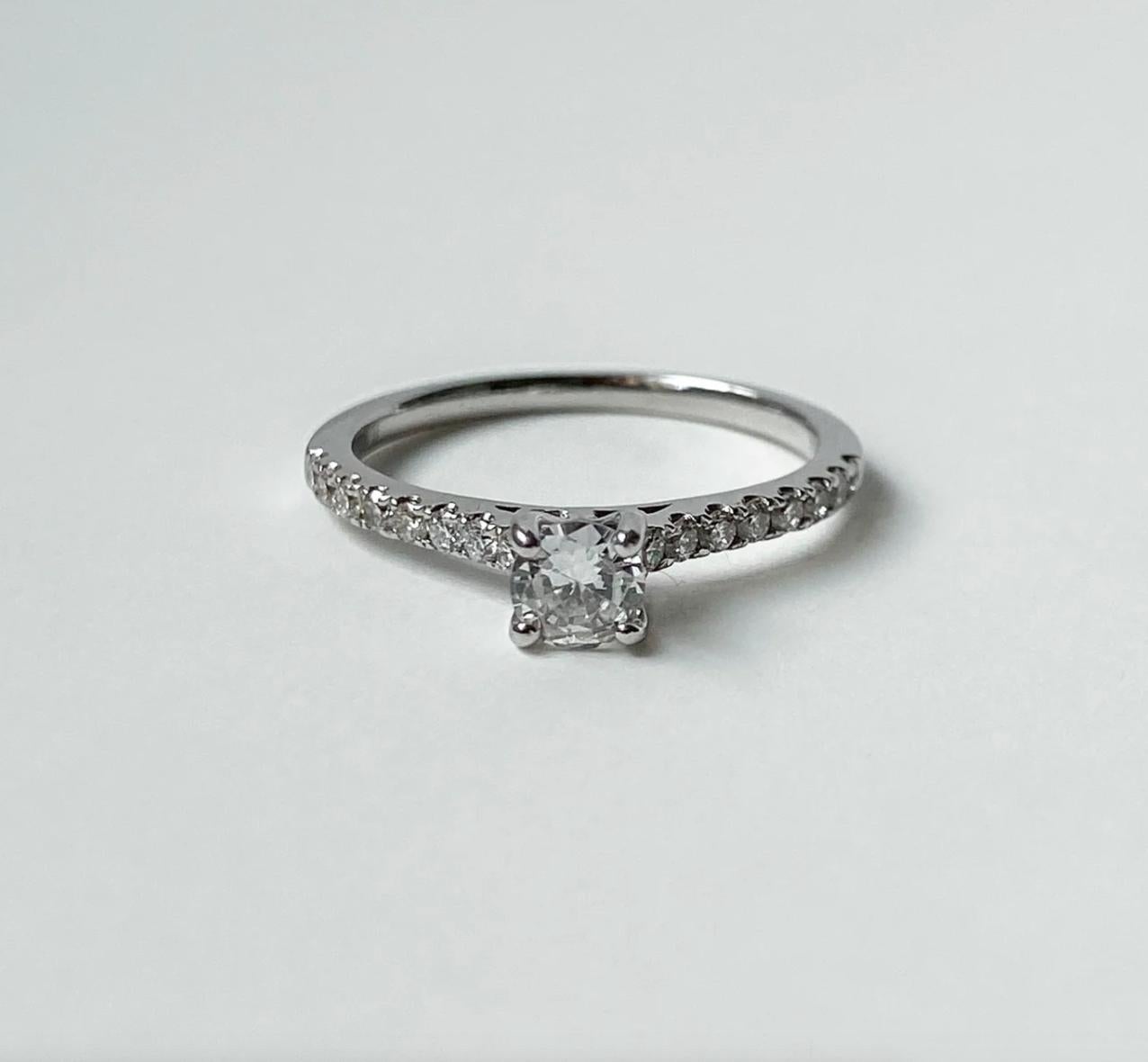 Brilliant Cut Classic Diamond Solitaire Ring with Diamond Shoulders 18k White Gold 0.50ct For Sale