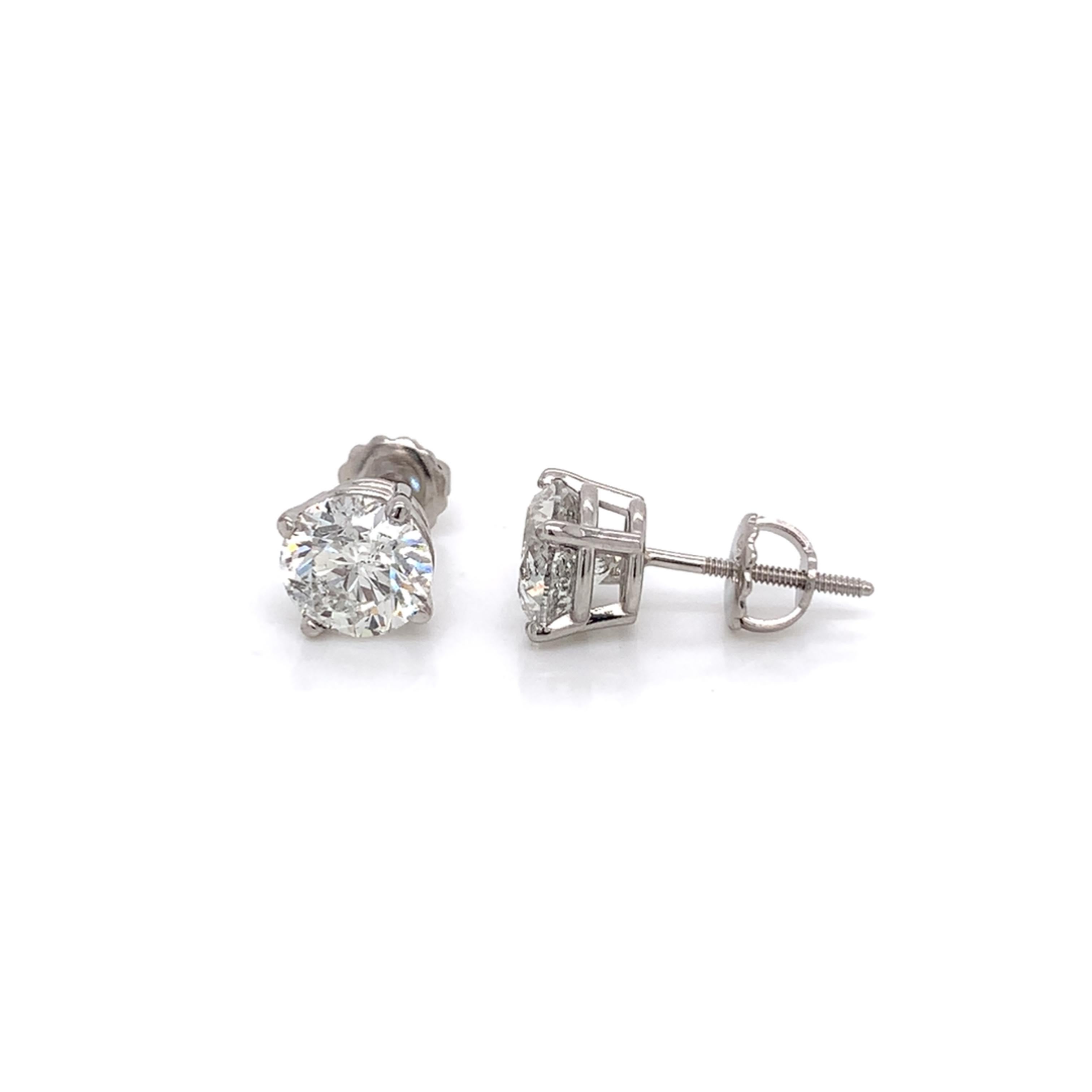 3.00 Carat Diamond Stud earrings made with real/natural brilliant cut diamonds. Total Diamond Weight: 3.12 carats. Diamond Quantity: 2 round diamonds. Color: G-H Clarity: SI3-I1. Mounted on 18kt white gold screw back setting.