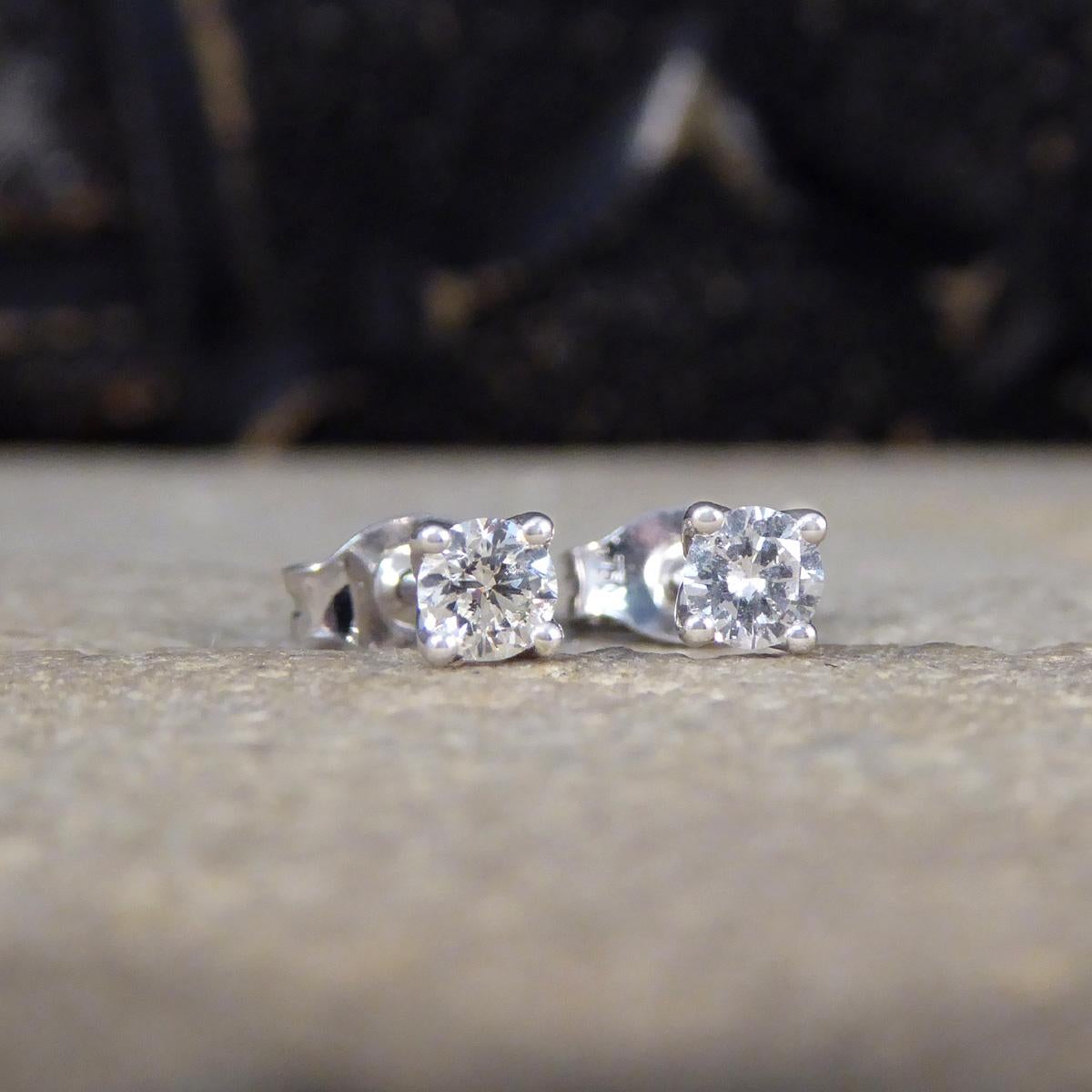 The perfect pair of stud earrings for everyday wear, for the main or second piercing. Each stud is set with a Round Brilliant Cut Diamond, matching well in clarity and weighing a total of 0.25ct with one colour grade difference but unnoticeable when
