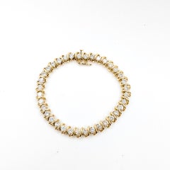 Bracciale tennis classico con diamanti in oro giallo 14k