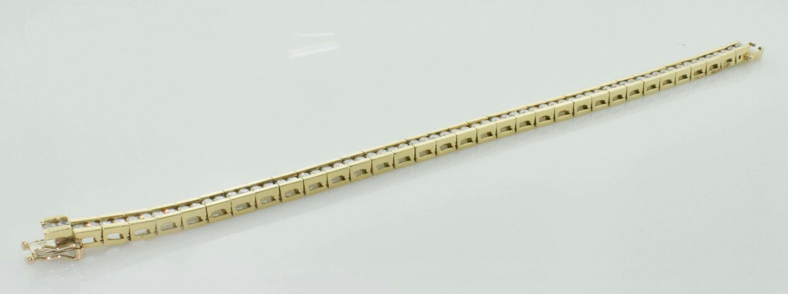 Classic Diamond Tennis Bracelet in 18k Yellow Gold 3.75 carats
Sixty Eight Round Brilliant Cut Diamonds Weighing 3.75 Carats Approximately [GH - VVS/VS1]

6 5/8