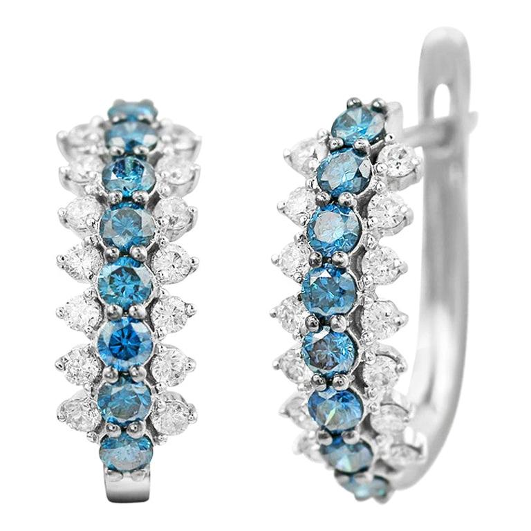 Boucles d'oreilles classiques en or blanc et diamants