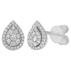 Clous d'oreilles classiques en or blanc et diamants