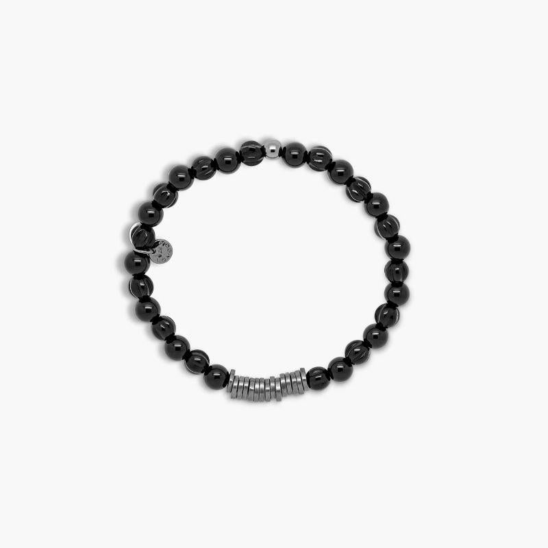 Classic Discs Bracelet with Agate and Rhodium Plated Silver, Size L

Black agate beads are paired with hand-polished, black rhodium plated sterling silver discs. Crafted and carved uniquely by hand in our Imperial Wharf, central London workshop,