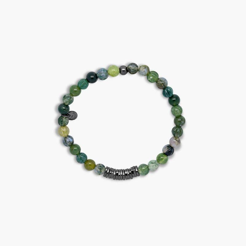 Classic Discs Bracelet with Moss Agate and Rhodium Plated Silver, Size L

Moss agate beads are paired with hand polished, black rhodium-plated sterling silver discs, crafted in our Imperial Wharf, central London workshop, creating our iconic series