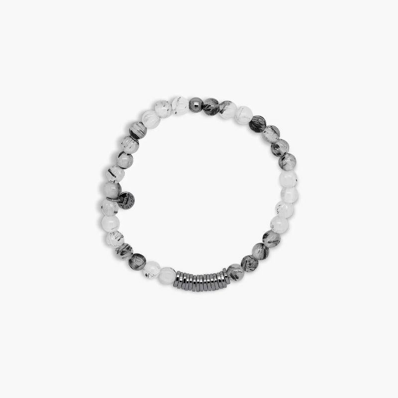 Classic Discs Bracelet with Rutilated Quartz and Black Rhodium Plated Silver, Size L

Black rutilated quartz beads are paired with hand polished, black rhodium-plated sterling silver discs, crafted in our Imperial Wharf, central London workshop,