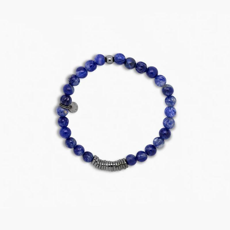 Classic Discs Bracelet with Sodalite and Rhodium Plated Silver, Size L

Sodalite beads are paired with hand-polished, black rhodium plated sterling silver discs. Crafted and carved uniquely by hand in our Imperial Wharf, central London workshop,
