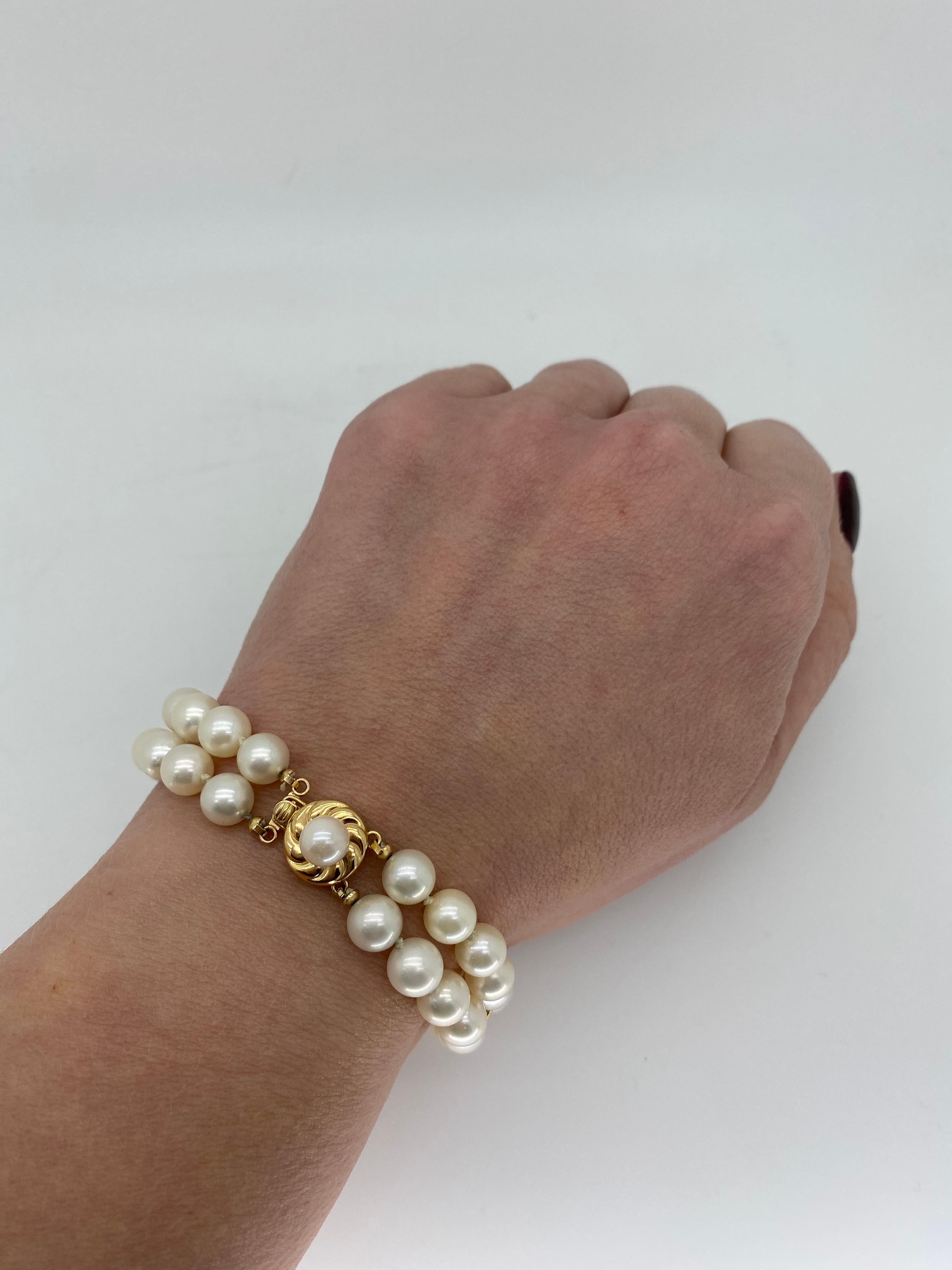Classic double strand pearl bracelet with 14k yellow gold clasp.

Gemstone: Pearl
Gemstone Carat Weight: Approximately 7.25mm Round Pearls
Metal: 14K Yellow Gold
Marked/Tested: Stamped “14K
