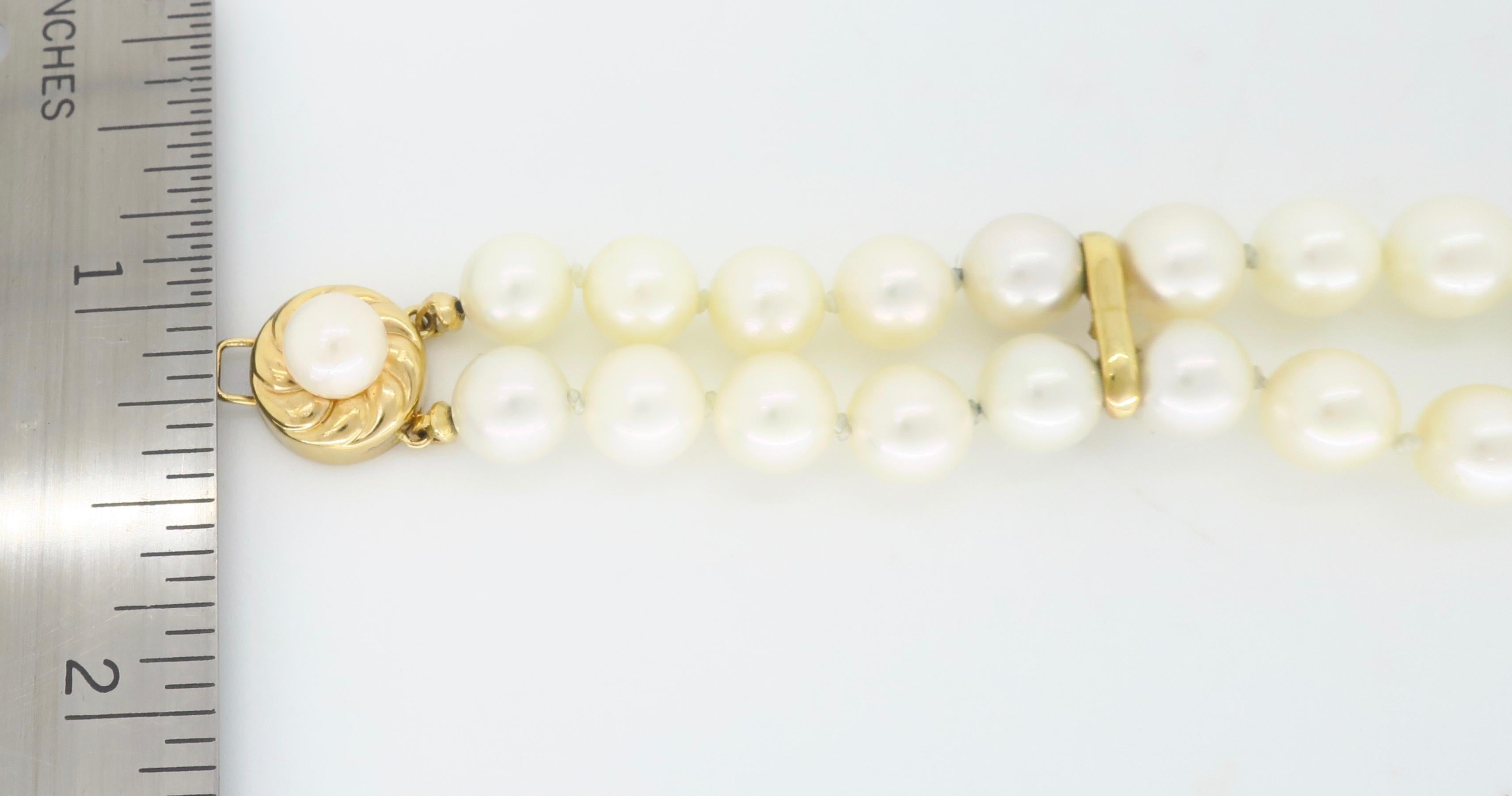 Round Cut Classic Double Strand Pearl Bracelet with 14 Karat Yellow Gold Clasp