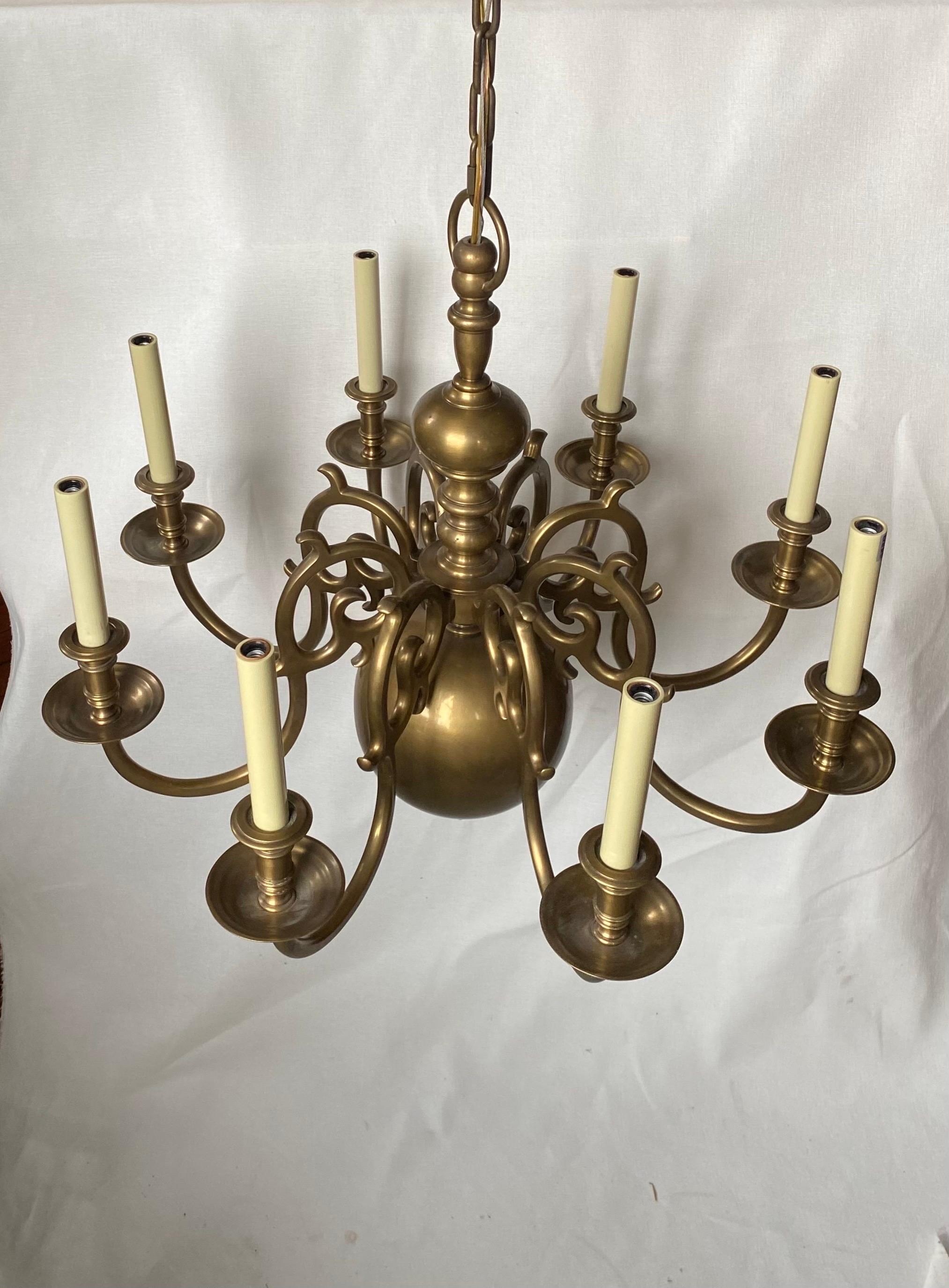 Large handsome Dutch Baroque style 8-Light chandelier by Visual Comfort.  This classic Georgian style chandelier has a beautiful brass patina with bronze undertones.  A classic traditional piece with timeless appeal.  Includes canopy and 13 Inches