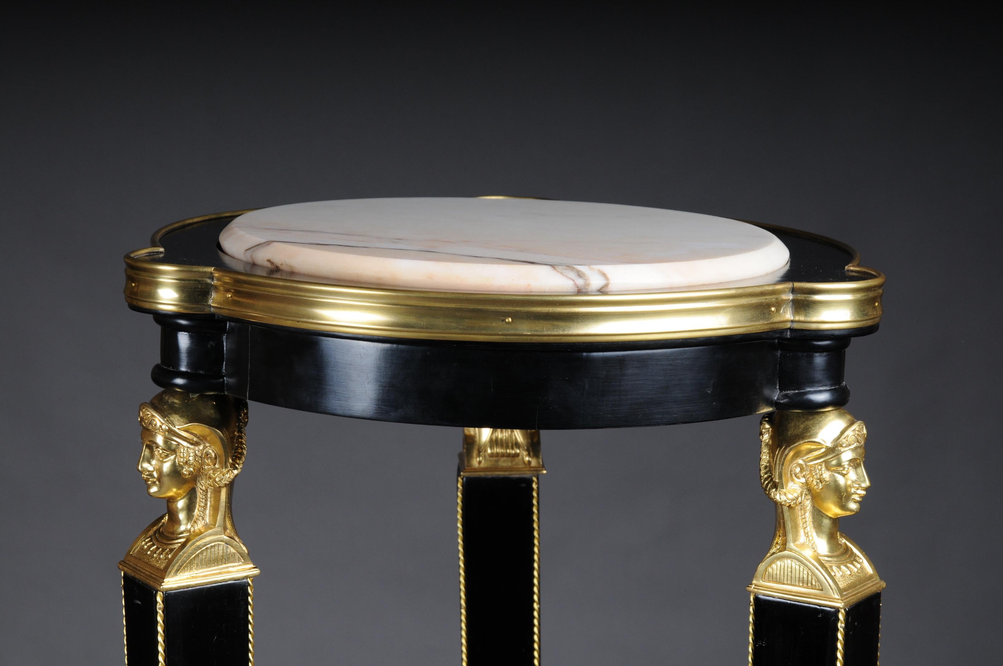 black and gold pedestals