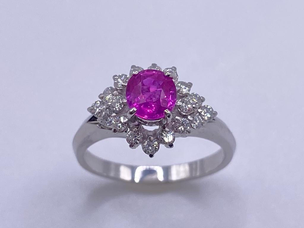 Bochic Platinum 900 Cluster Diamond & Pink Sapphire Ring 
Pink Sapphire 0.88 Carat 
Diamonds 0.35 Carat 
Color F 
Clarity VS 
5.50 Gram 

Elegant, Classic and Chic 
The cluster ring is an elegant symbol of lifelong commitment when you find that