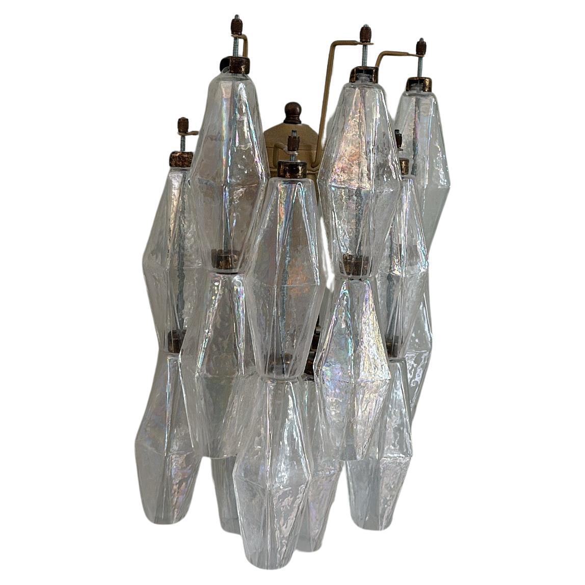 Lampada da parete per corridoio e cucina di Murano composta da 17 prismi di cristallo fatti a mano in vetro di Murano trasparente. Struttura della lampada in metallo con accessori verniciati in tonalità marrone chiaro e bronzo. Vetro del distretto